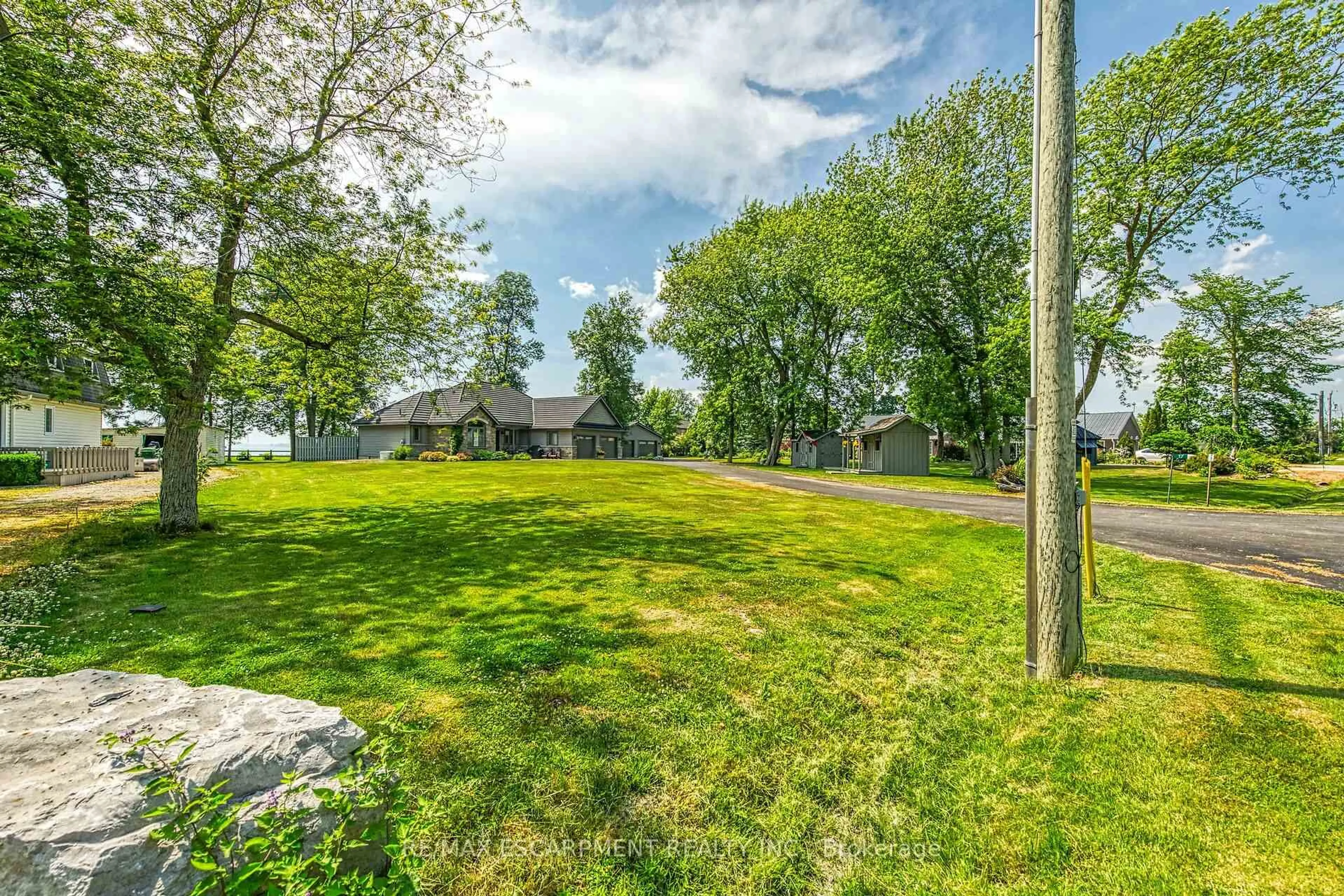 A pic from outside/outdoor area/front of a property/back of a property/a pic from drone, water/lake/river/ocean view for 17 BATES Lane, Haldimand Ontario N1A 2W8