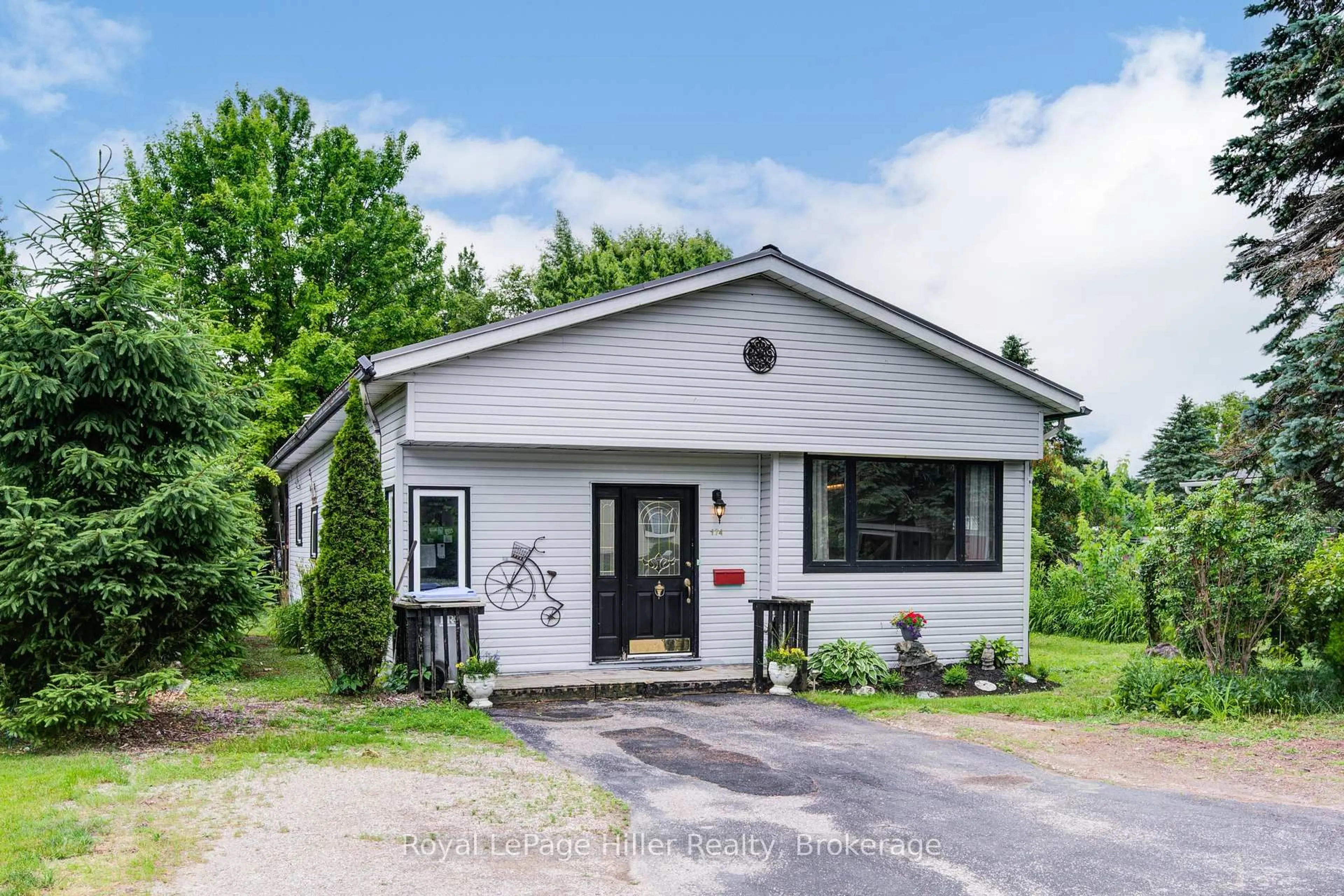 Home with vinyl exterior material, street for 174 BIRCH St, Perth East Ontario N5A 6S6