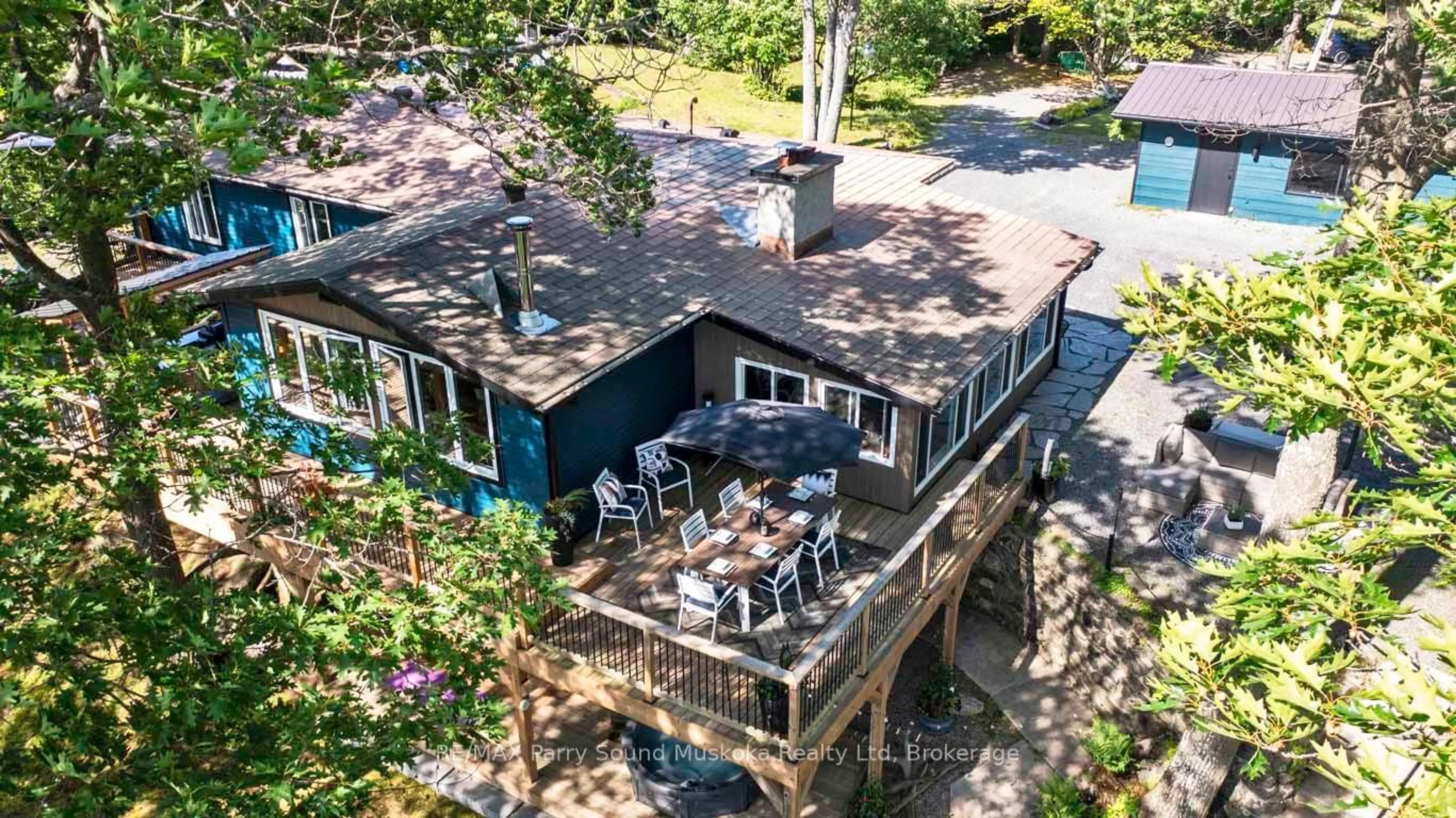 A pic from outside/outdoor area/front of a property/back of a property/a pic from drone, water/lake/river/ocean view for 16 Birch Cres, Seguin Ontario P2A 0B2