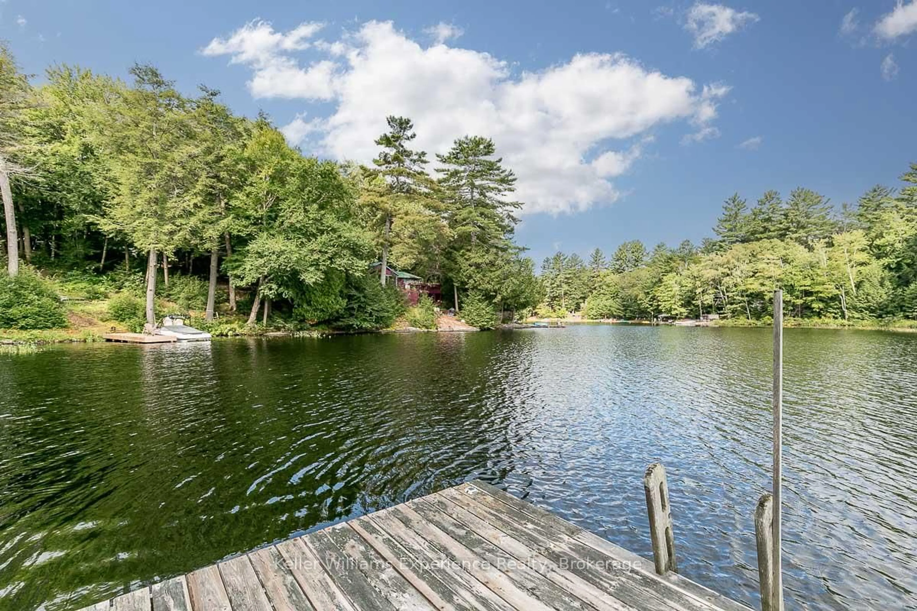 A pic from outside/outdoor area/front of a property/back of a property/a pic from drone, water/lake/river/ocean view for 1123 Stone Gate Lane, Bracebridge Ontario P1L 1X1