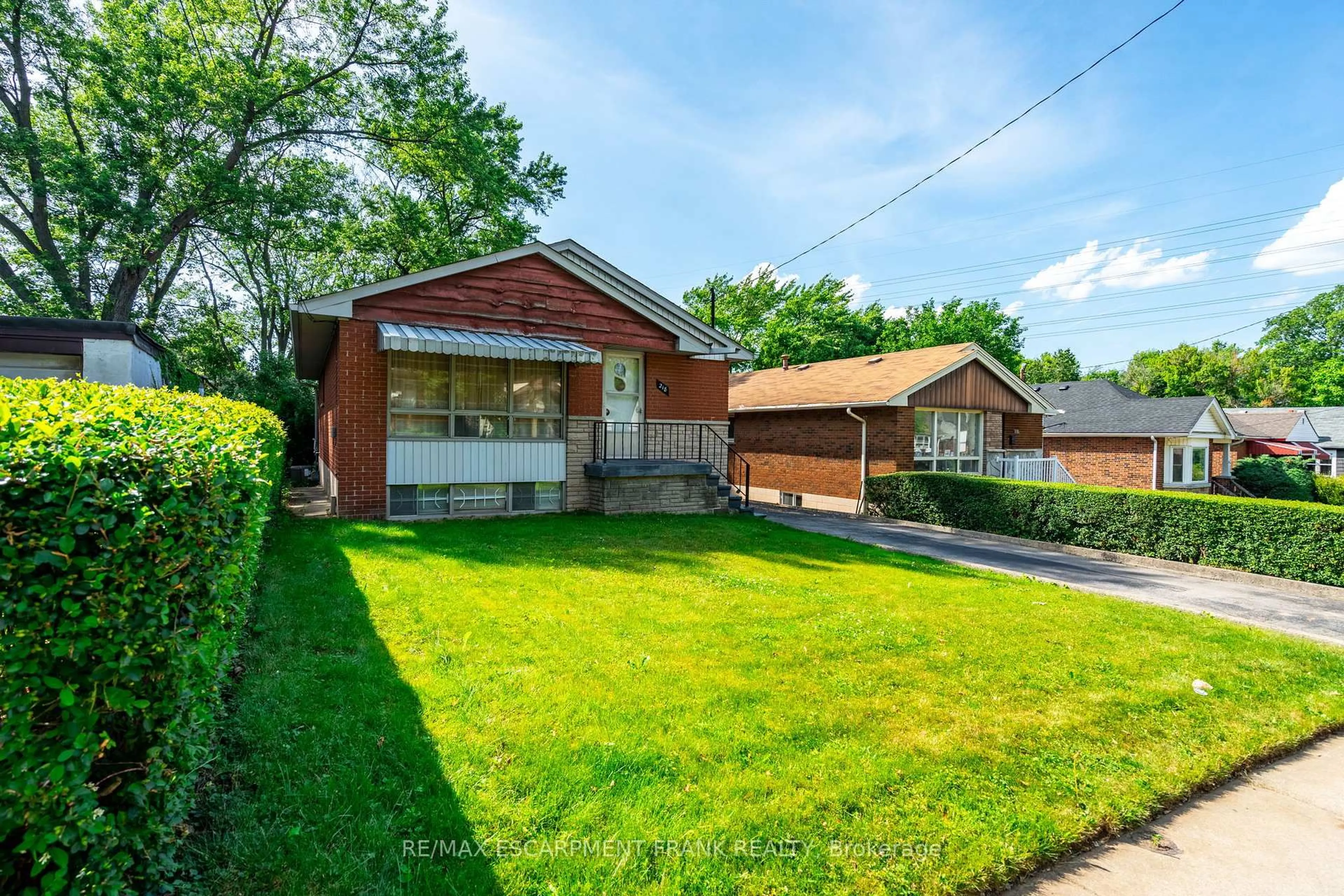 Home with brick exterior material, street for 218 BOWMAN St, Hamilton Ontario L8S 2V1