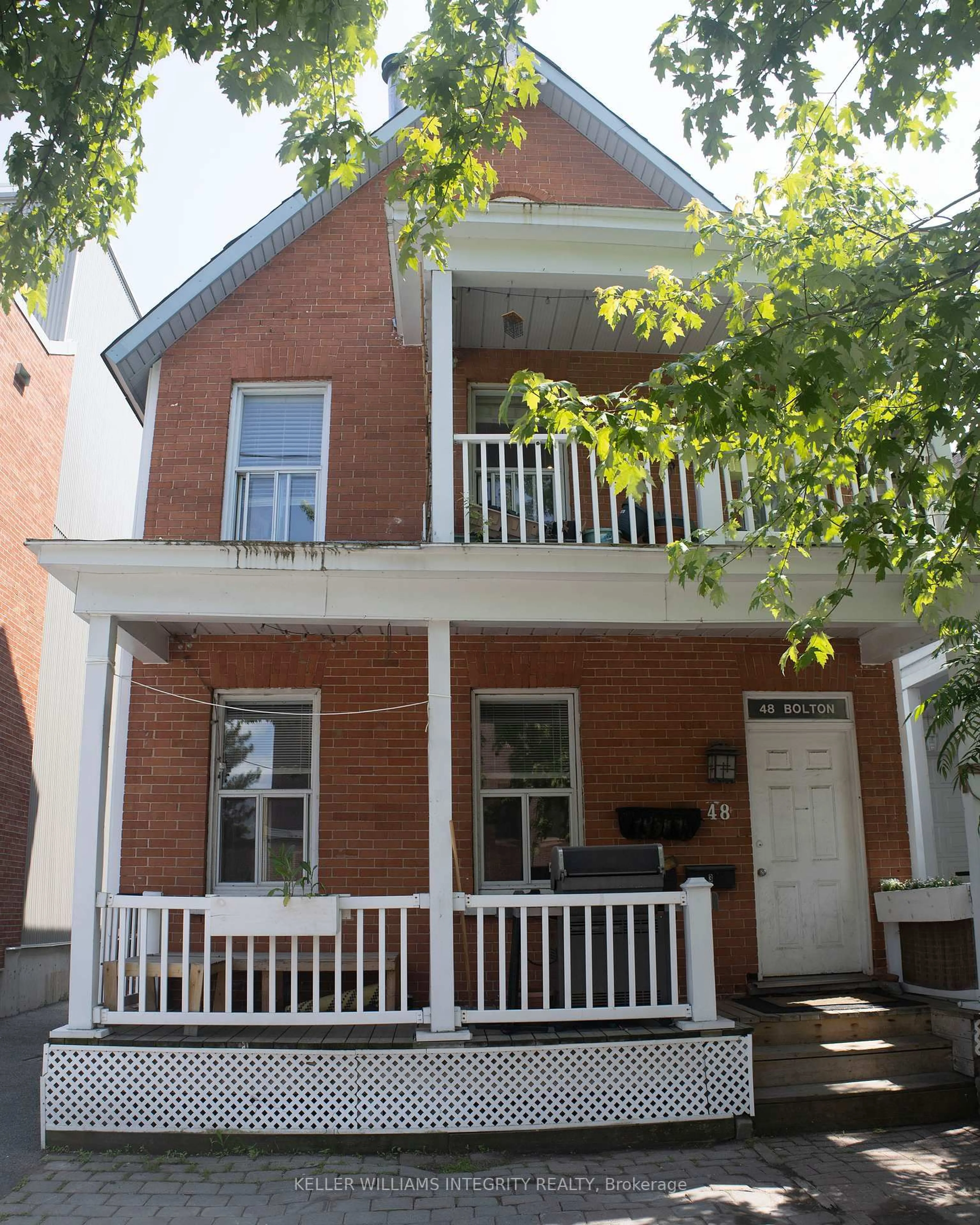 Home with brick exterior material, street for 48 Bolton St, Ottawa Ontario K1N 1K7