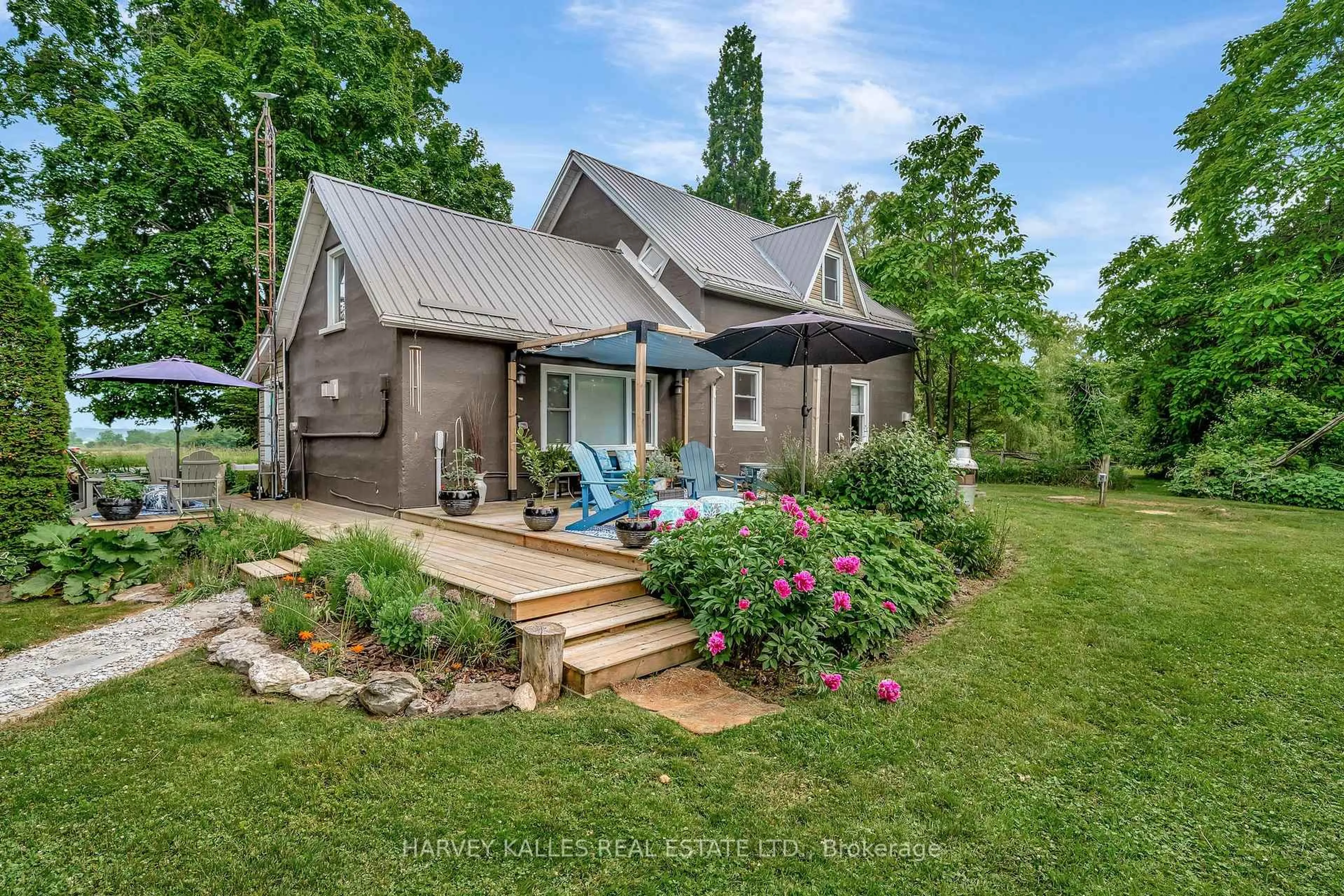A pic from outside/outdoor area/front of a property/back of a property/a pic from drone, unknown for 286 County Rd 11 Rd, Prince Edward County Ontario K0K 2T0