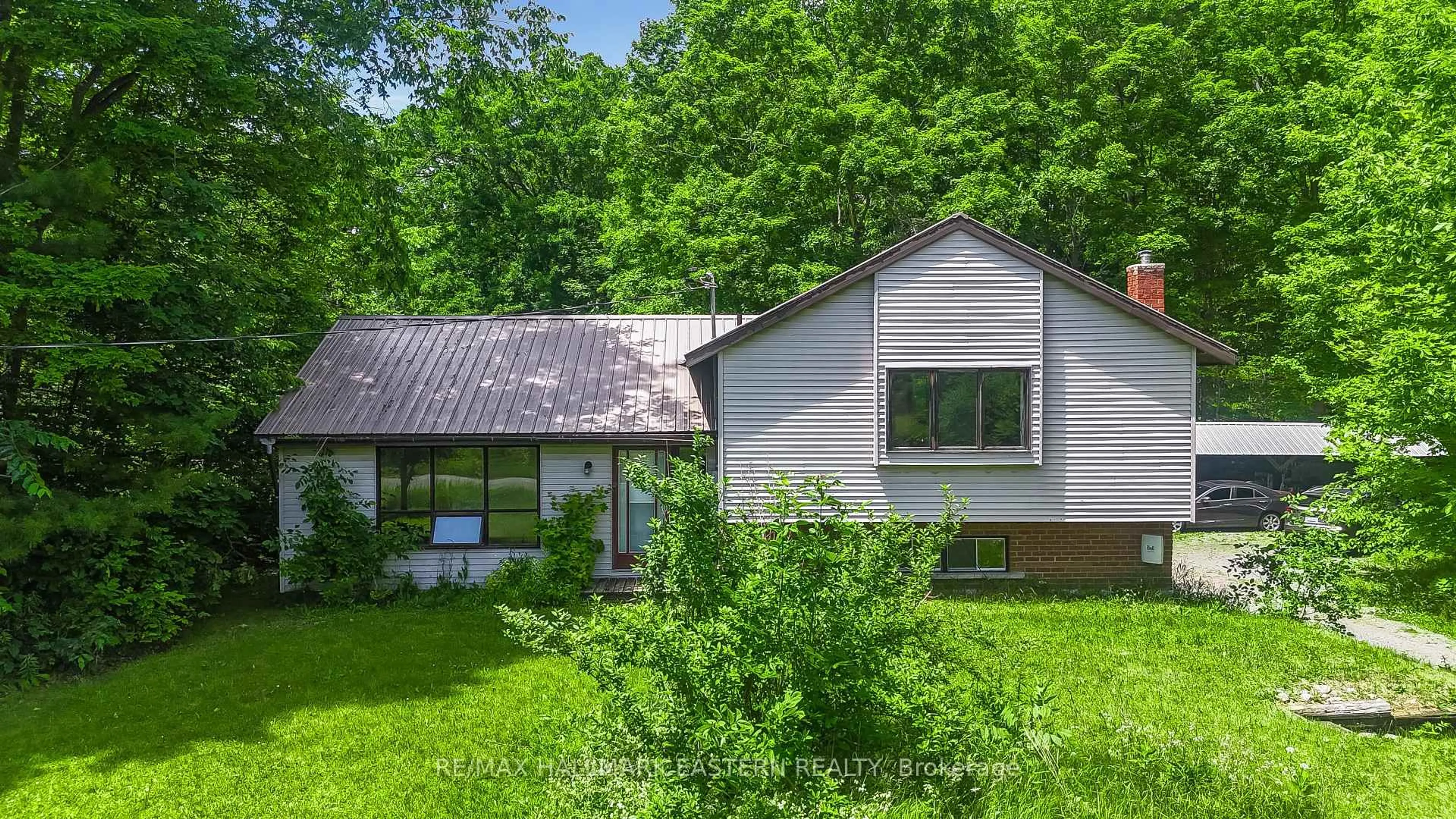 Home with vinyl exterior material, forest/trees view for 2890 North School Rd, Havelock-Belmont-Methuen Ontario K0L 1Z0