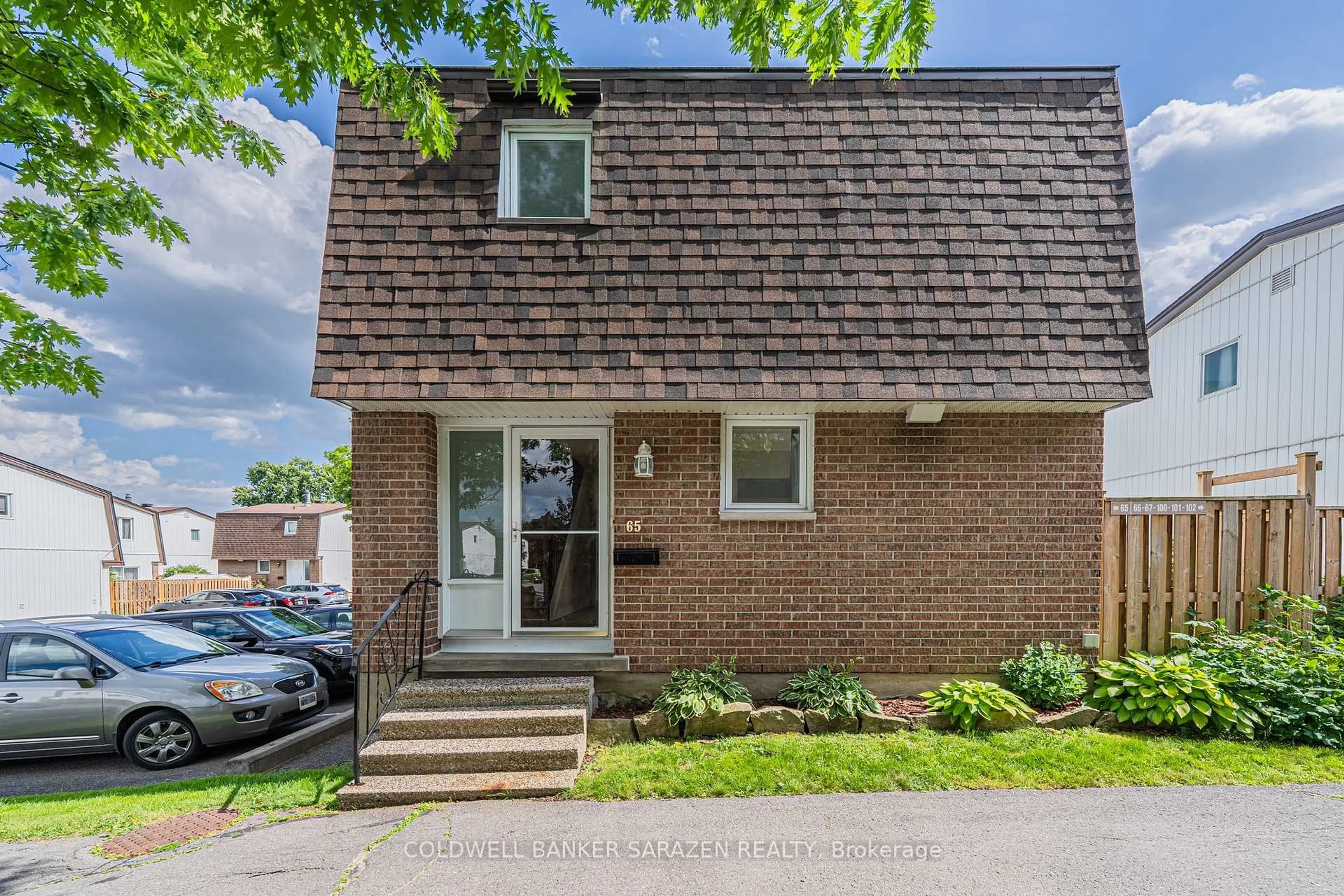 Home with brick exterior material, street for 837 Eastvale Dr #65, Ottawa Ontario K1J 7T5