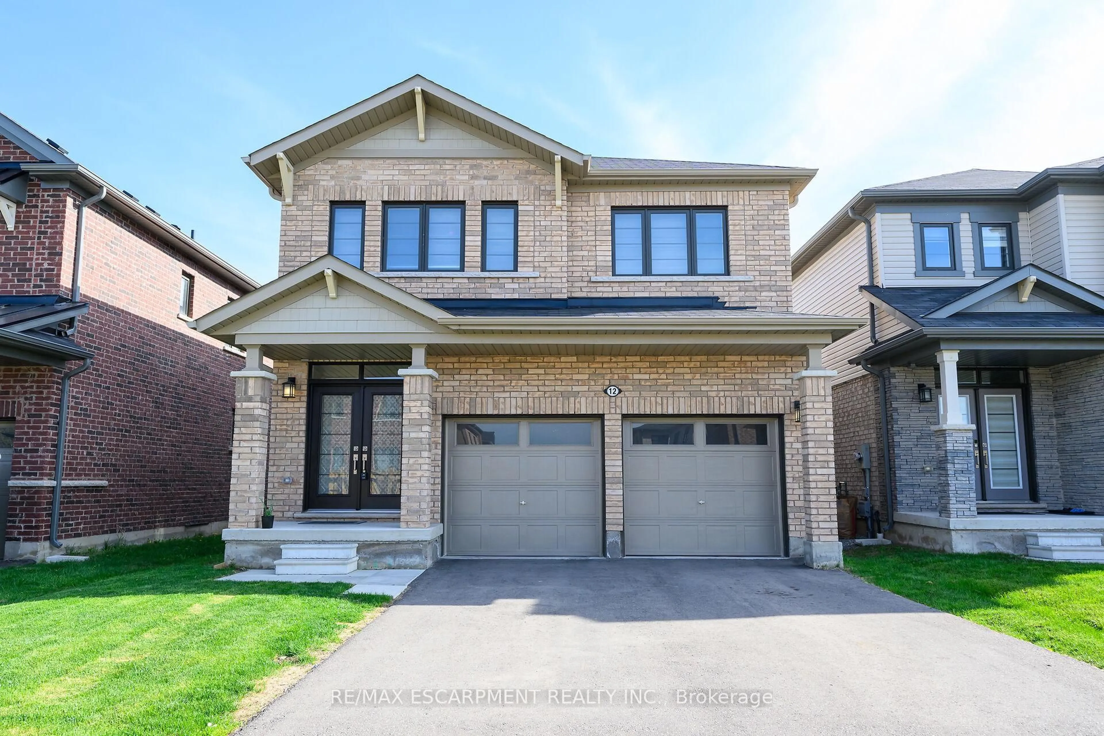 Home with brick exterior material, street for 12 Midhurst Hts, Hamilton Ontario L8J 0K9