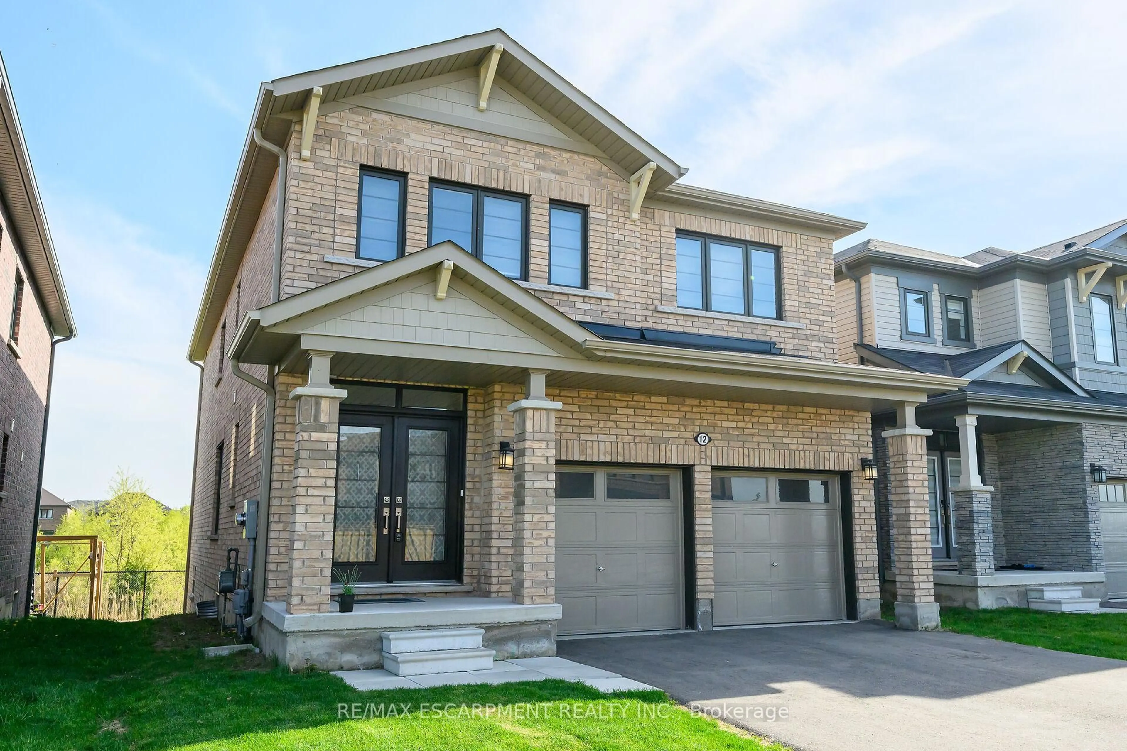 Home with brick exterior material, street for 12 Midhurst Hts, Hamilton Ontario L8J 0K9
