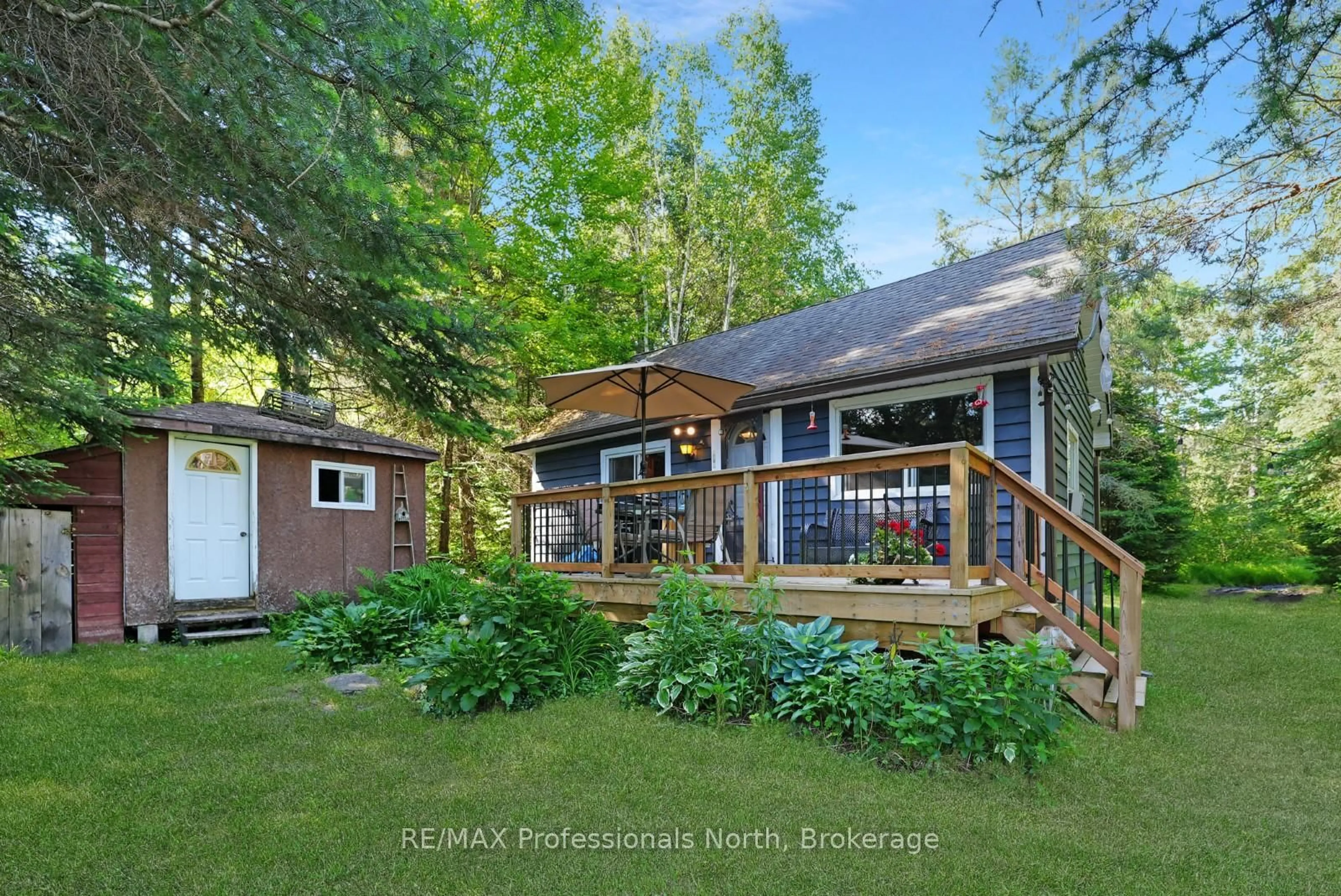 A pic from outside/outdoor area/front of a property/back of a property/a pic from drone, water/lake/river/ocean view for 1148 Morning Glory Dr, Highlands East Ontario K0M 1R0