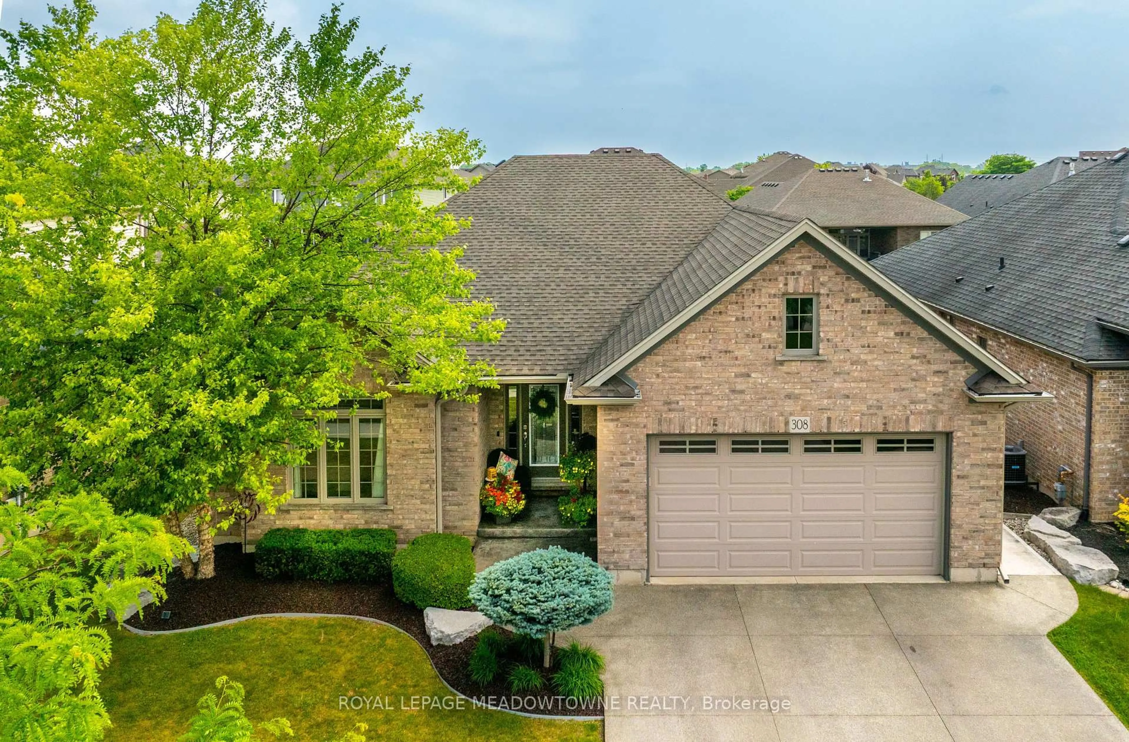 Home with brick exterior material, street for 308 Creekside Dr, Welland Ontario L3C 0B6