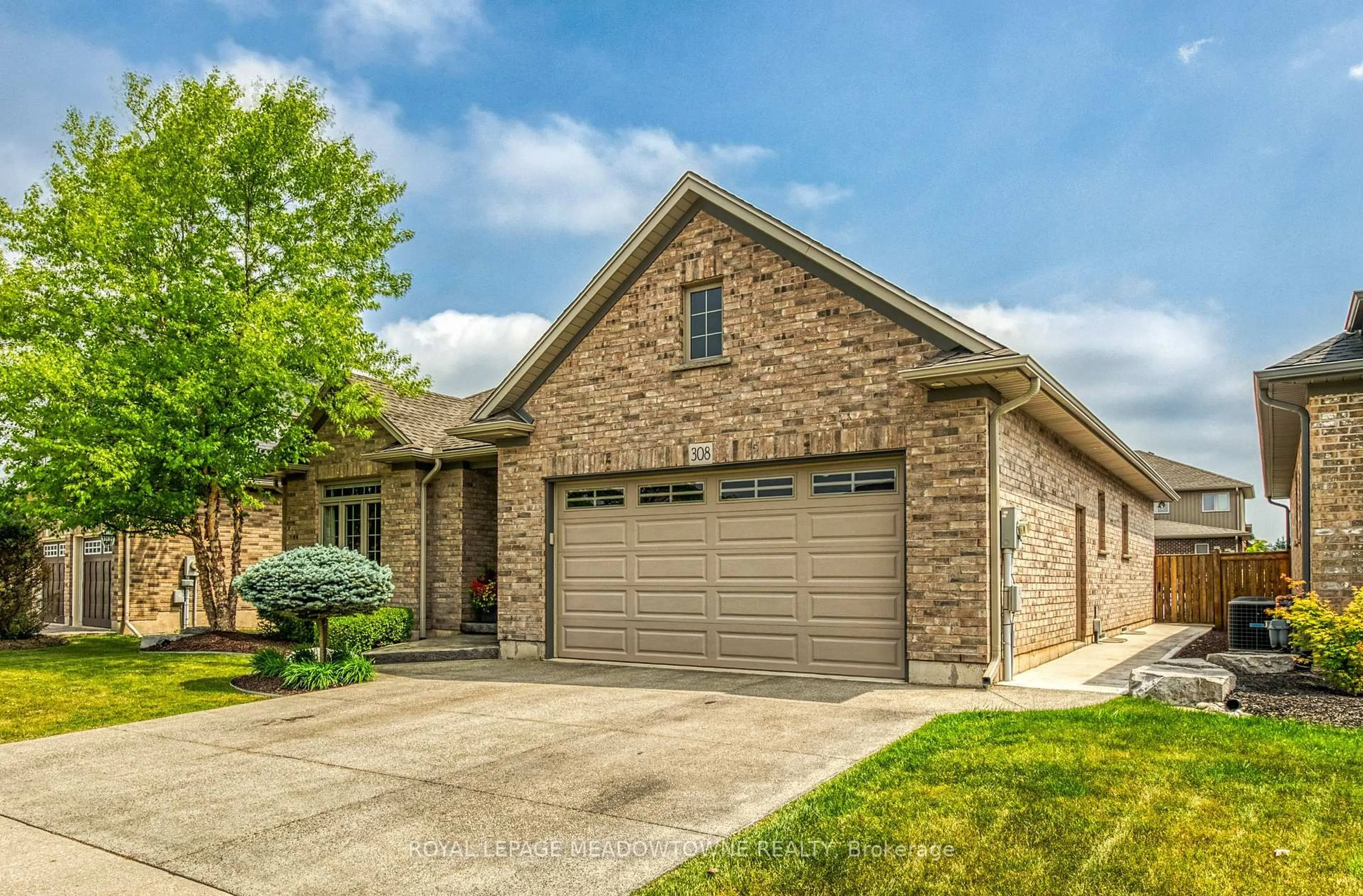Home with brick exterior material, street for 308 Creekside Dr, Welland Ontario L3C 0B6