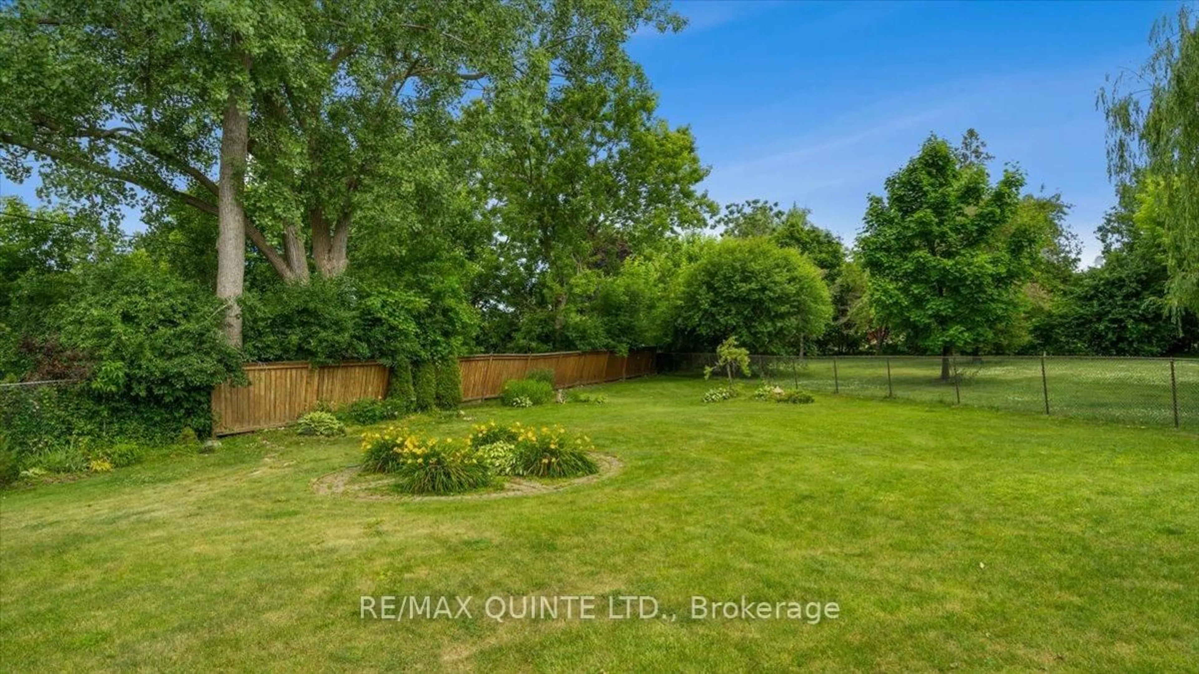 A pic from outside/outdoor area/front of a property/back of a property/a pic from drone, forest/trees view for 8 Enid Crt, Belleville Ontario K8P 1G3