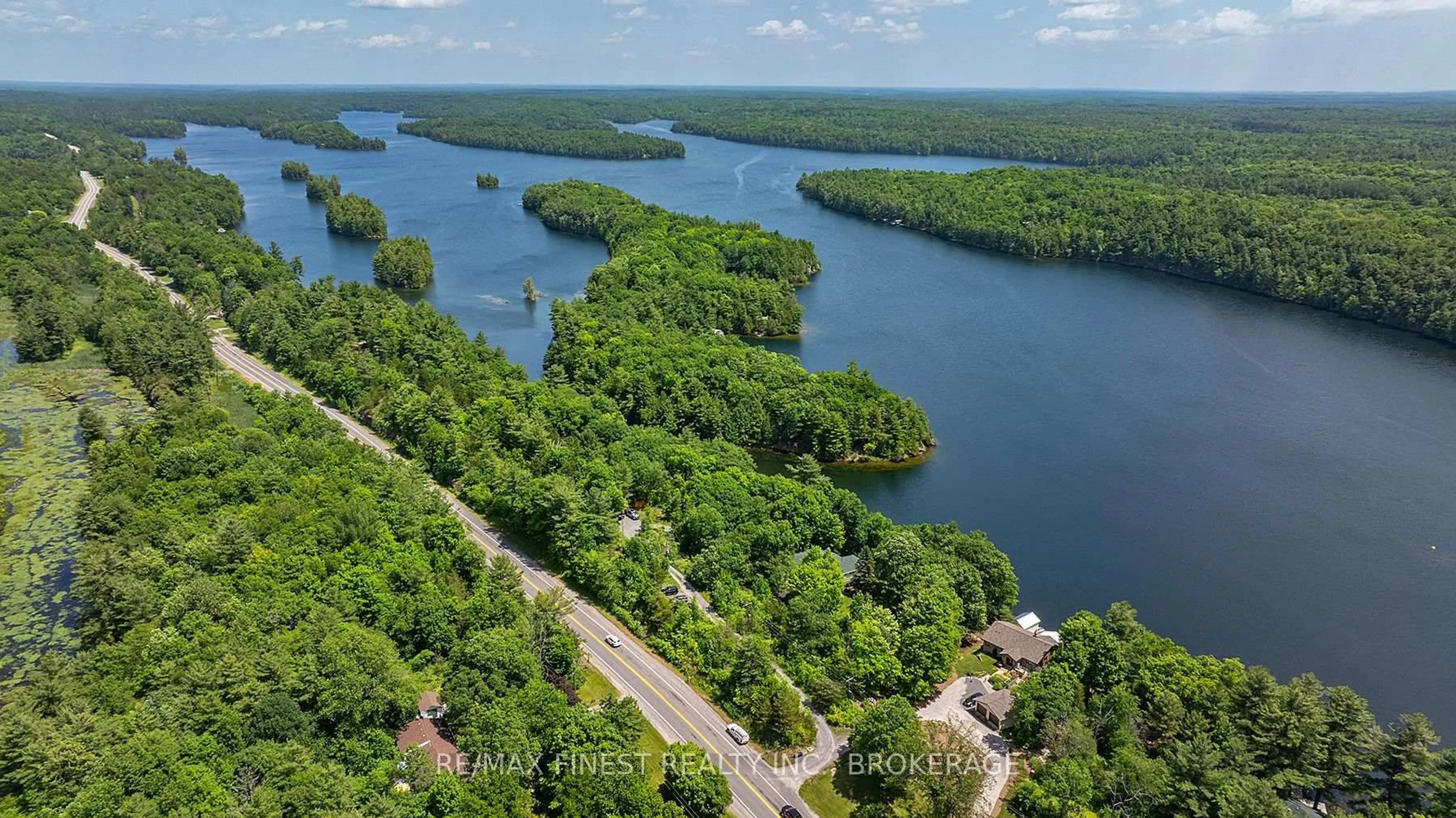 A pic from outside/outdoor area/front of a property/back of a property/a pic from drone, water/lake/river/ocean view for 1005 MacDonald Lane, Perth Road Ontario K0H 2L0
