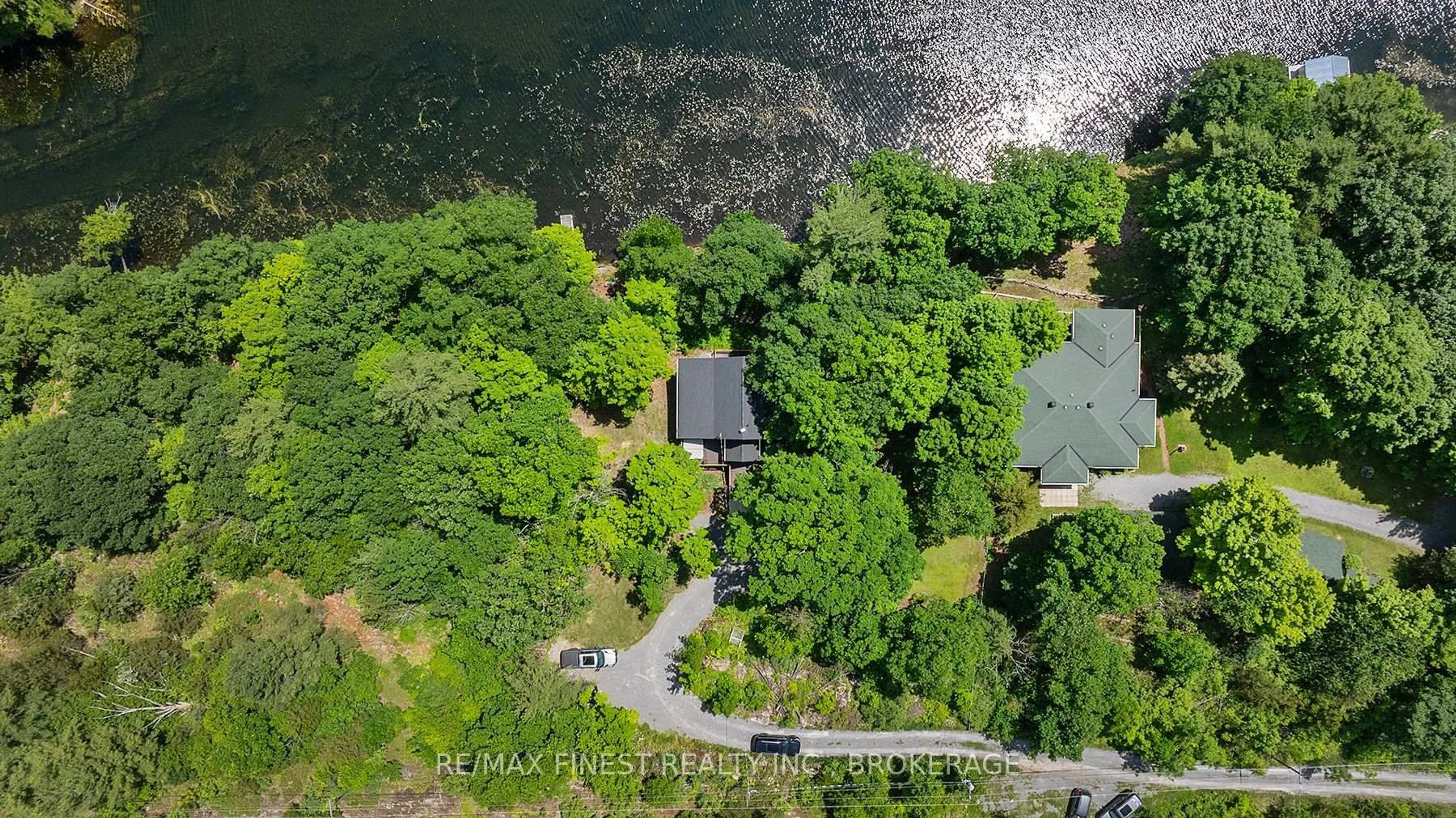 A pic from outside/outdoor area/front of a property/back of a property/a pic from drone, water/lake/river/ocean view for 1005 MacDonald Lane, Perth Road Ontario K0H 2L0