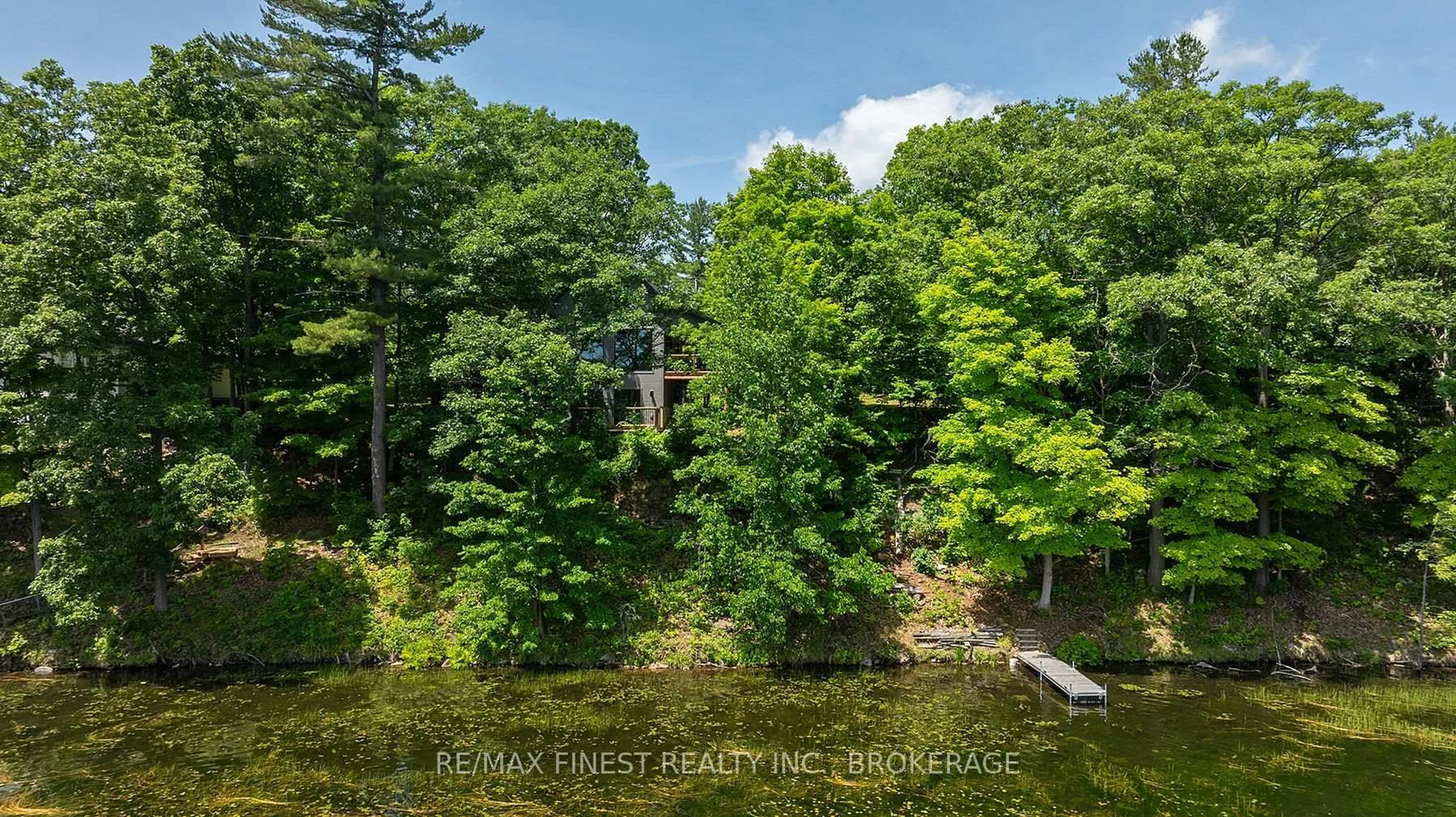 A pic from outside/outdoor area/front of a property/back of a property/a pic from drone, water/lake/river/ocean view for 1005 MacDonald Lane, Perth Road Ontario K0H 2L0