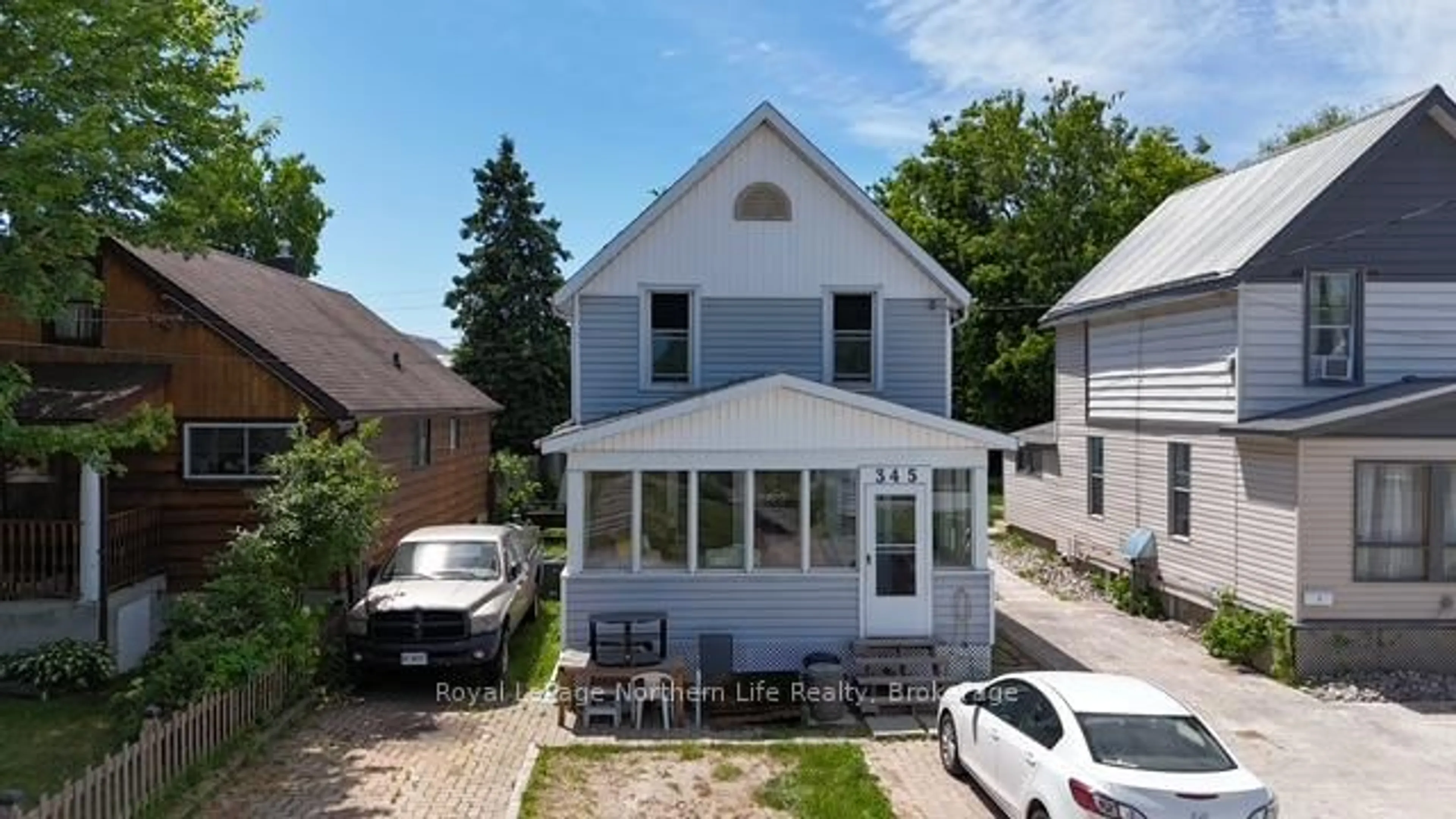 A pic from outside/outdoor area/front of a property/back of a property/a pic from drone, street for 345 Fourth Ave, North Bay Ontario P1B 1N3
