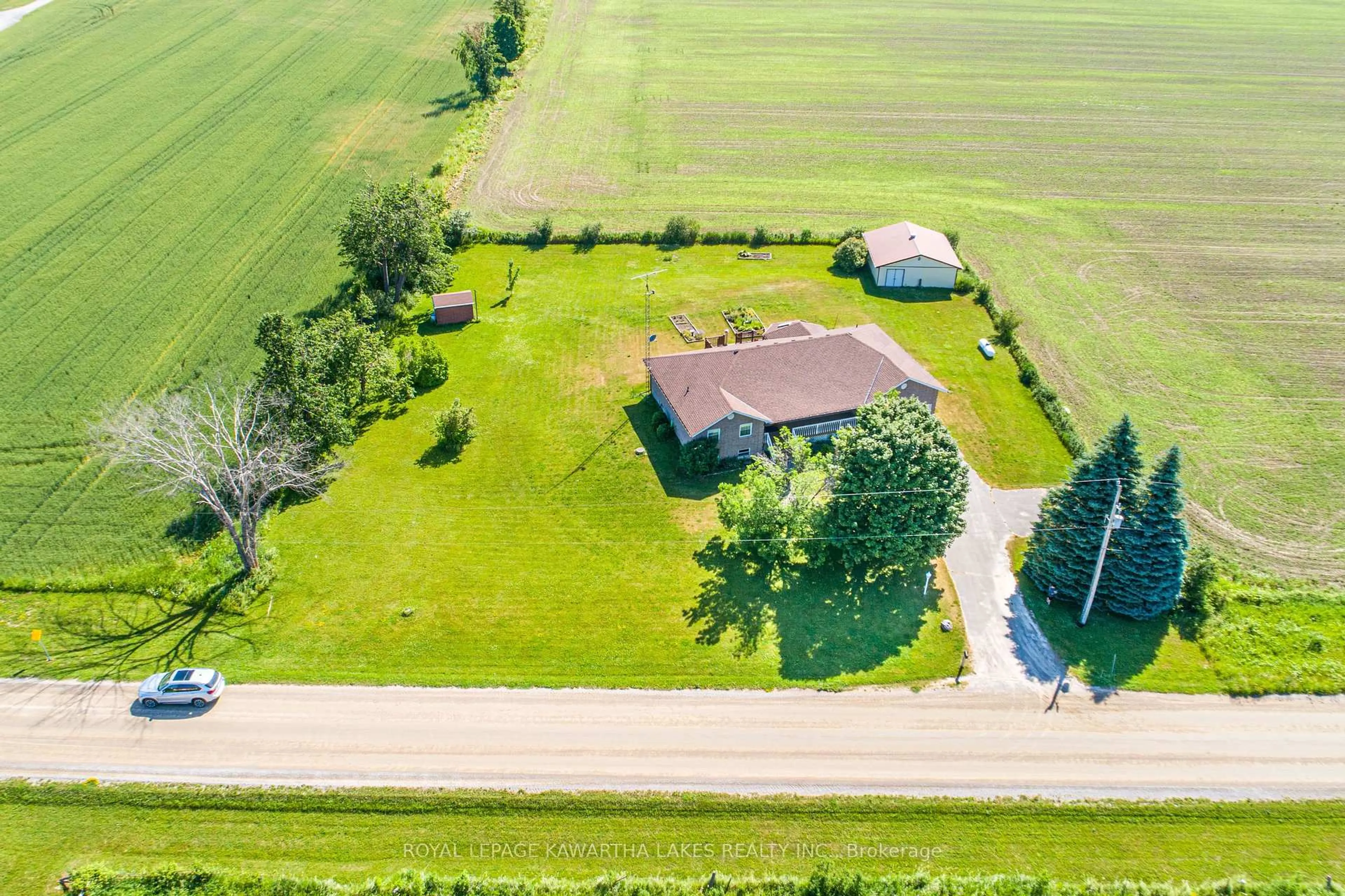 A pic from outside/outdoor area/front of a property/back of a property/a pic from drone, street for 120 Mark Rd, Kawartha Lakes Ontario K0M 2G0