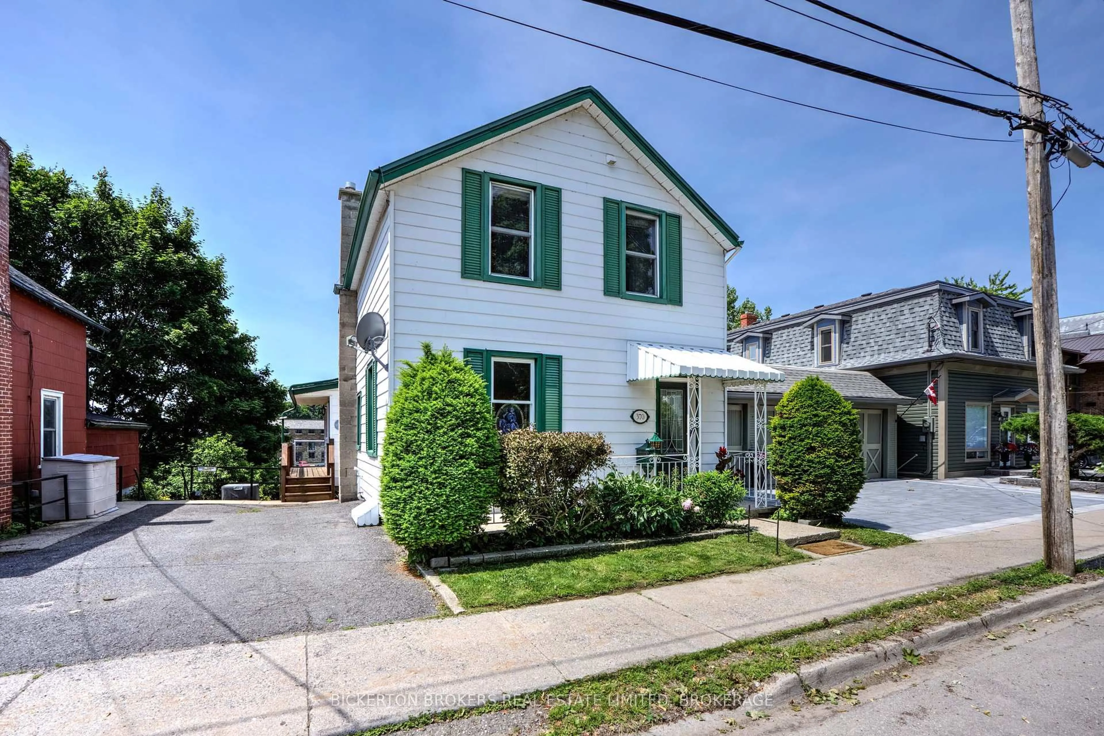 Home with vinyl exterior material, street for 370 Stone St, Gananoque Ontario K7G 2A4