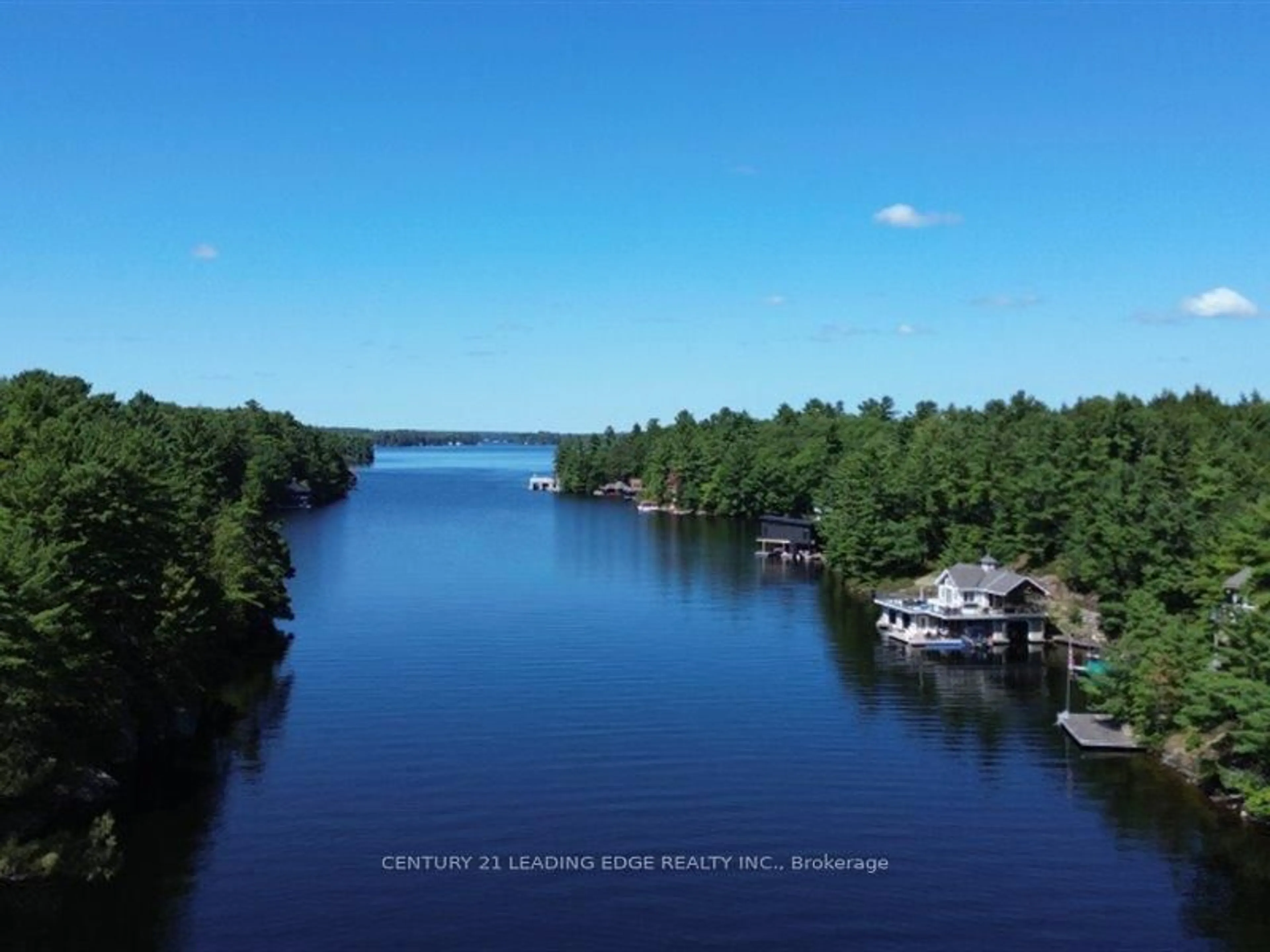 A pic from outside/outdoor area/front of a property/back of a property/a pic from drone, water/lake/river/ocean view for 2077 Lake Muskoka, Muskoka Lakes Ontario P0C 1M0