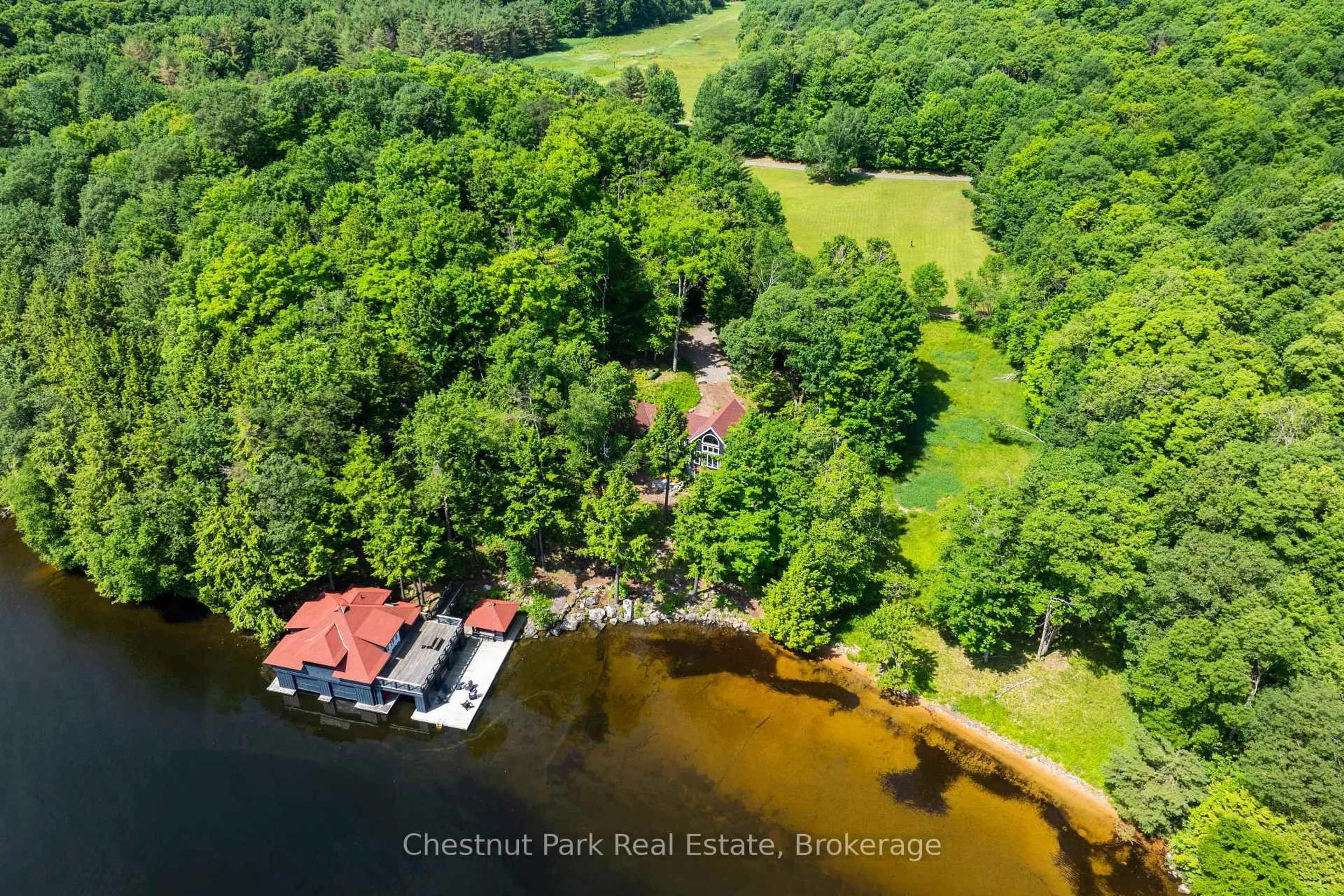 A pic from outside/outdoor area/front of a property/back of a property/a pic from drone, water/lake/river/ocean view for 37 Farm Sandy Bay Dr, Muskoka Lakes Ontario P0C 1J0