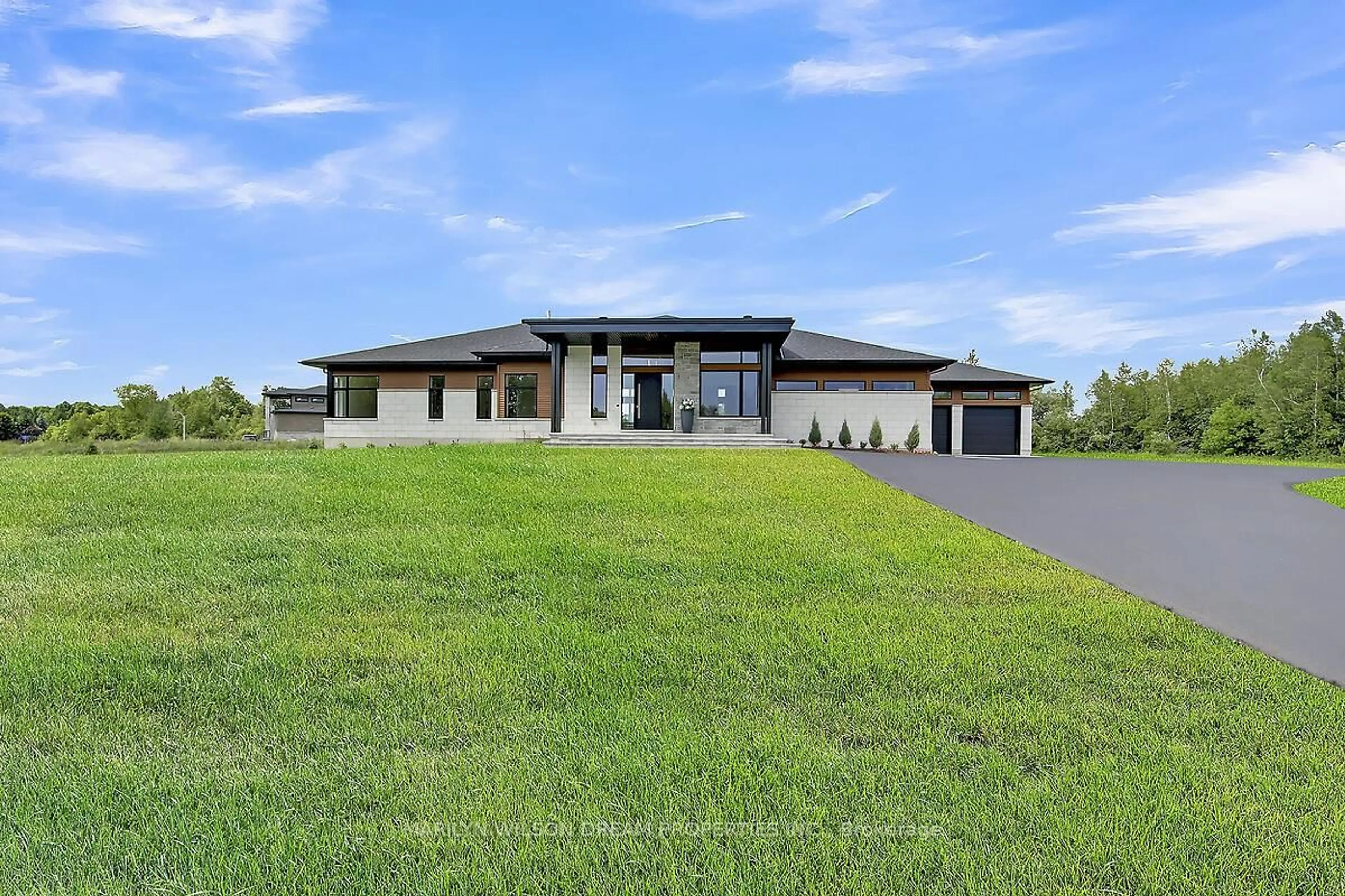 A pic from outside/outdoor area/front of a property/back of a property/a pic from drone, unknown for 1070 Green Jacket Cres, Greely Ontario K4P 0G6