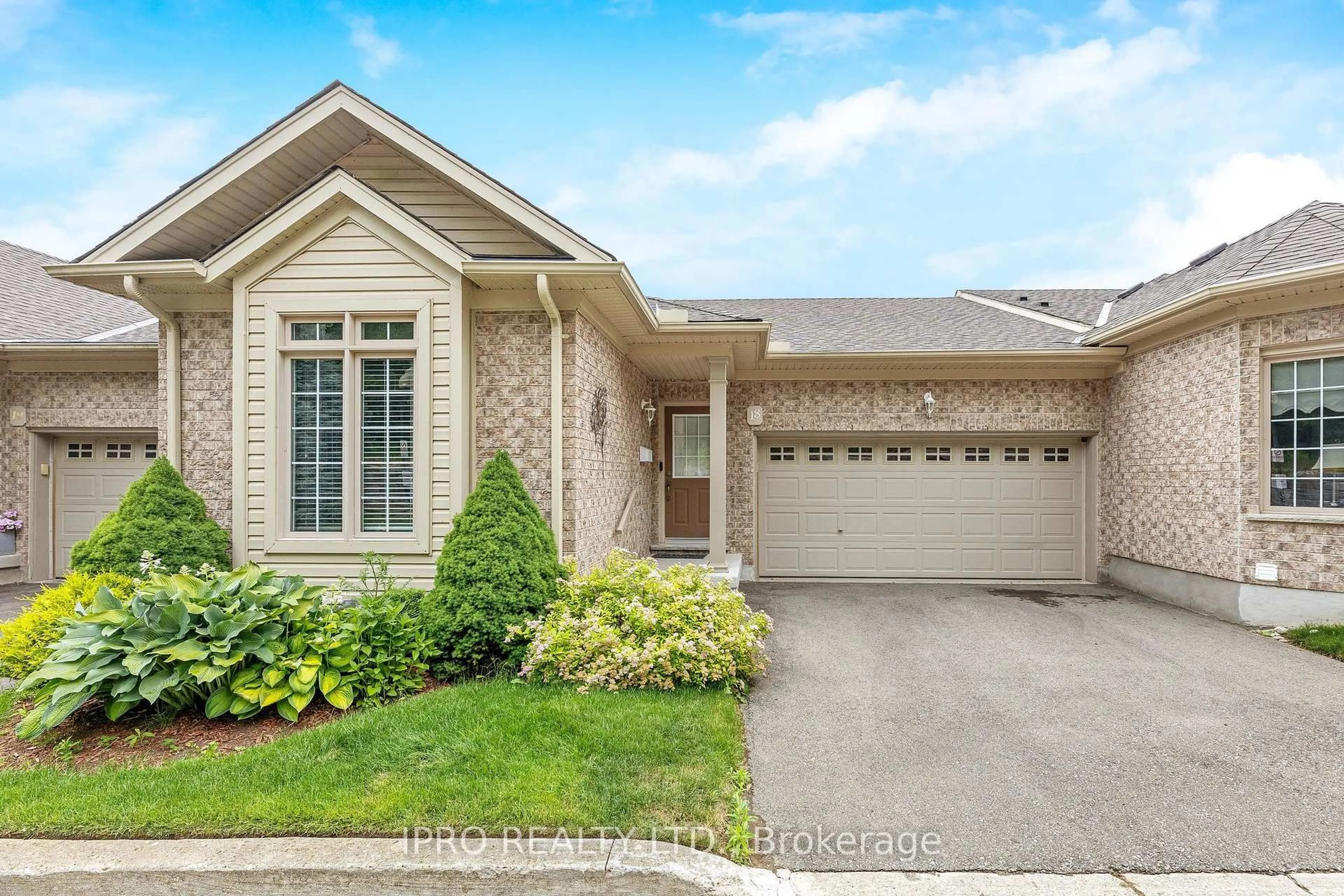 Home with brick exterior material, street for 165 Chandos Dr #18, Kitchener Ontario N2A 4H8