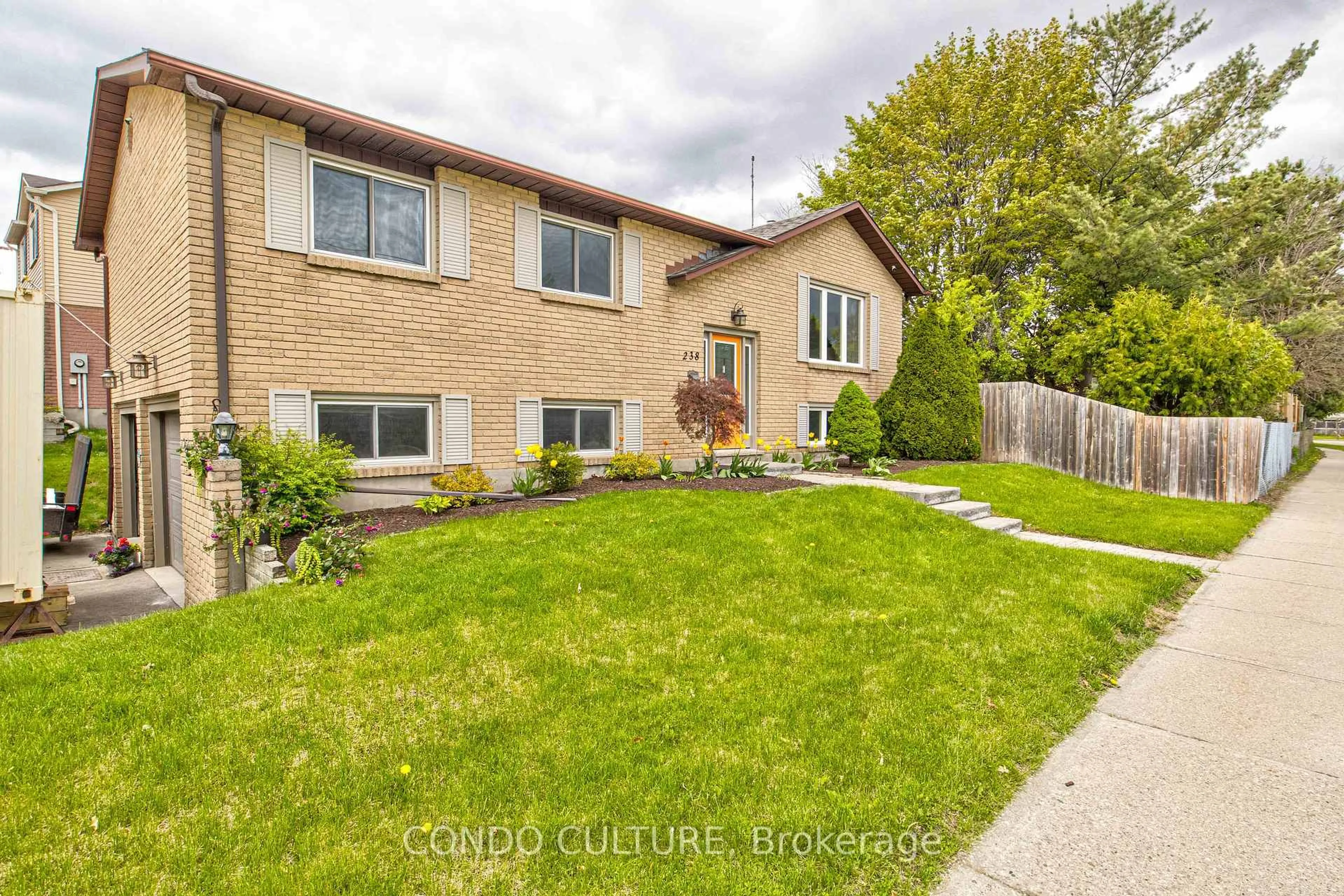 Home with brick exterior material, street for 238 Foxhunt Rd, Waterloo Ontario N2K 2R9