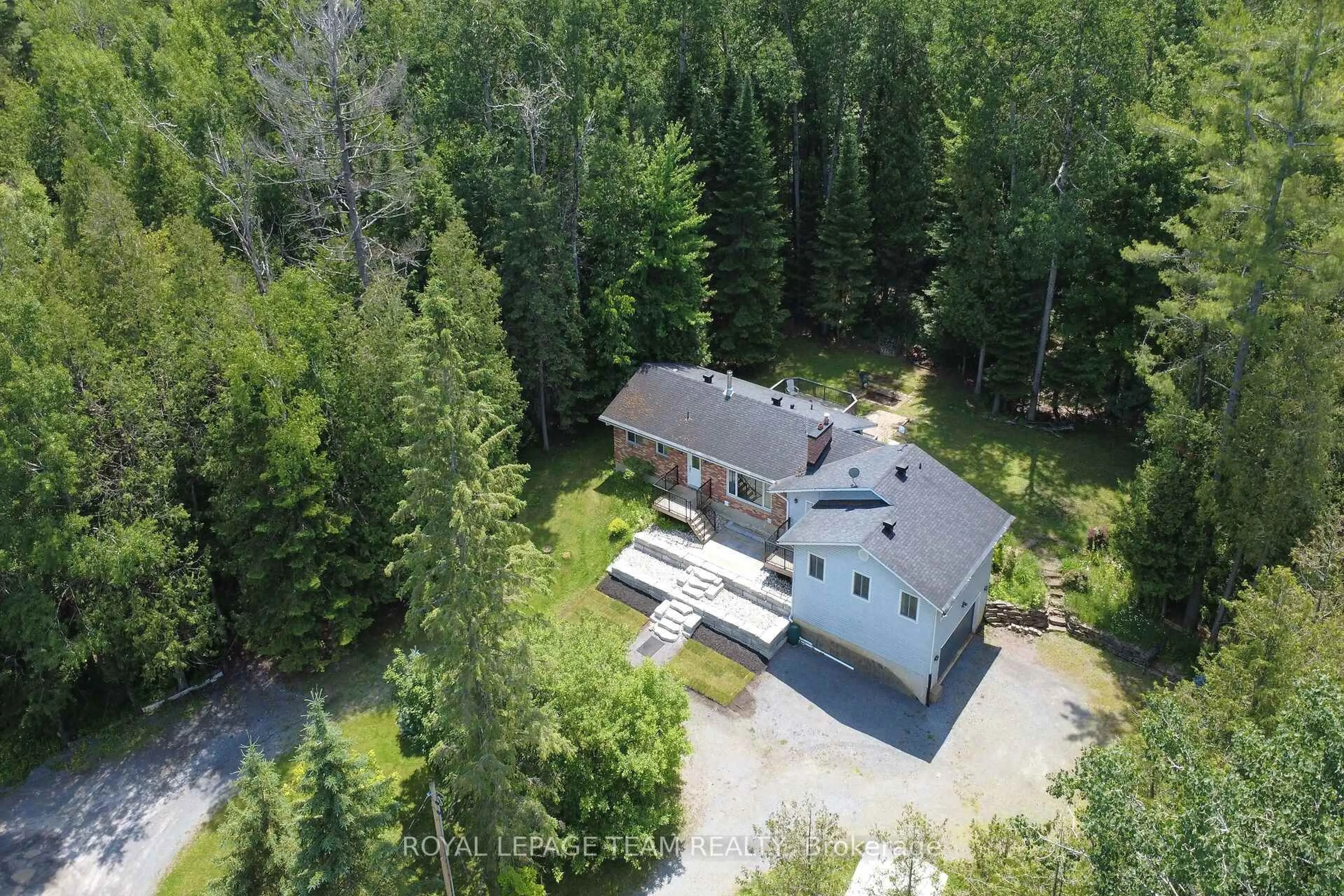 A pic from outside/outdoor area/front of a property/back of a property/a pic from drone, forest/trees view for 3681 Armitage Ave, Ottawa Ontario K0A 1T0
