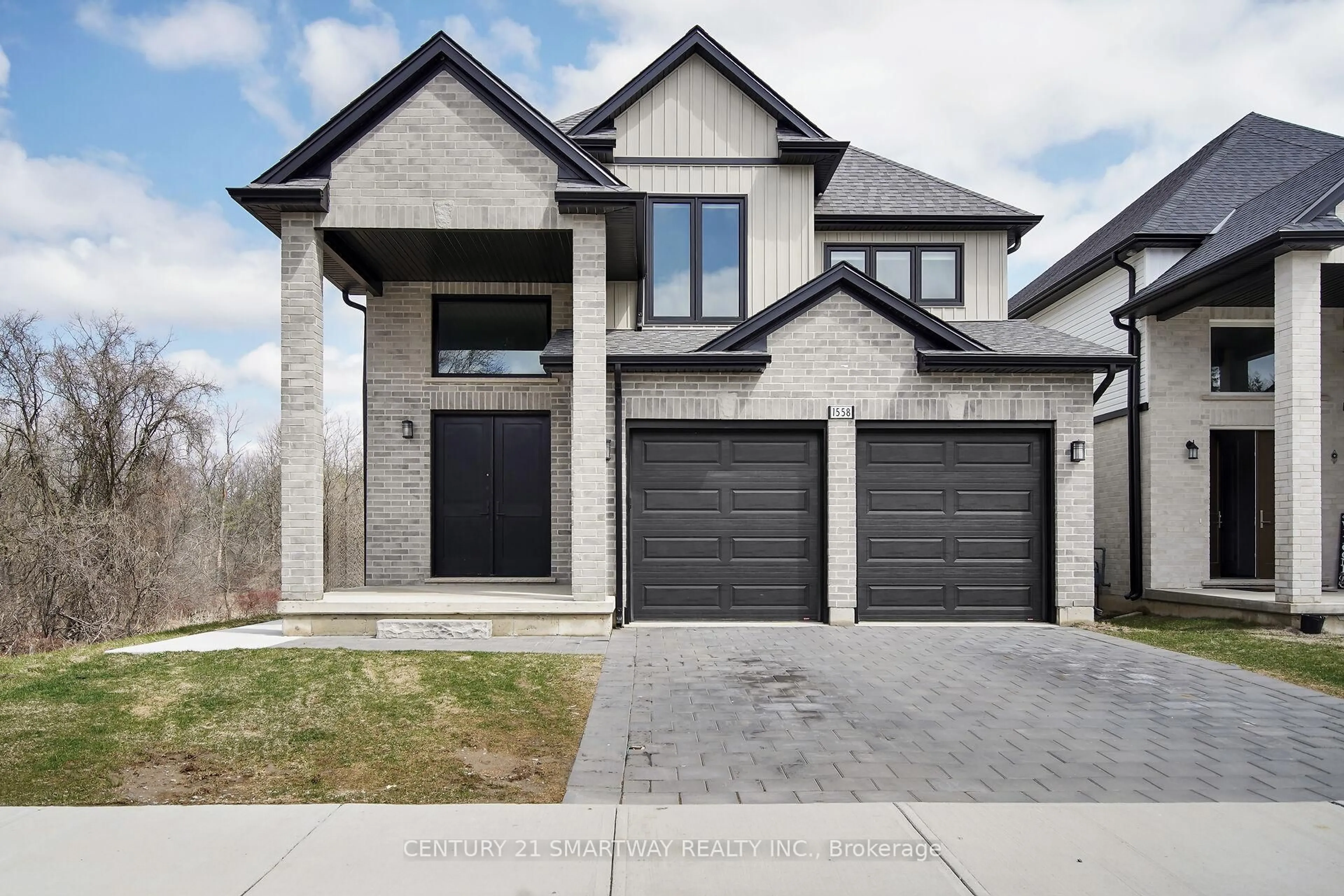 Home with brick exterior material, street for 1558 Chickadee Tr, London South Ontario N6M 0K1