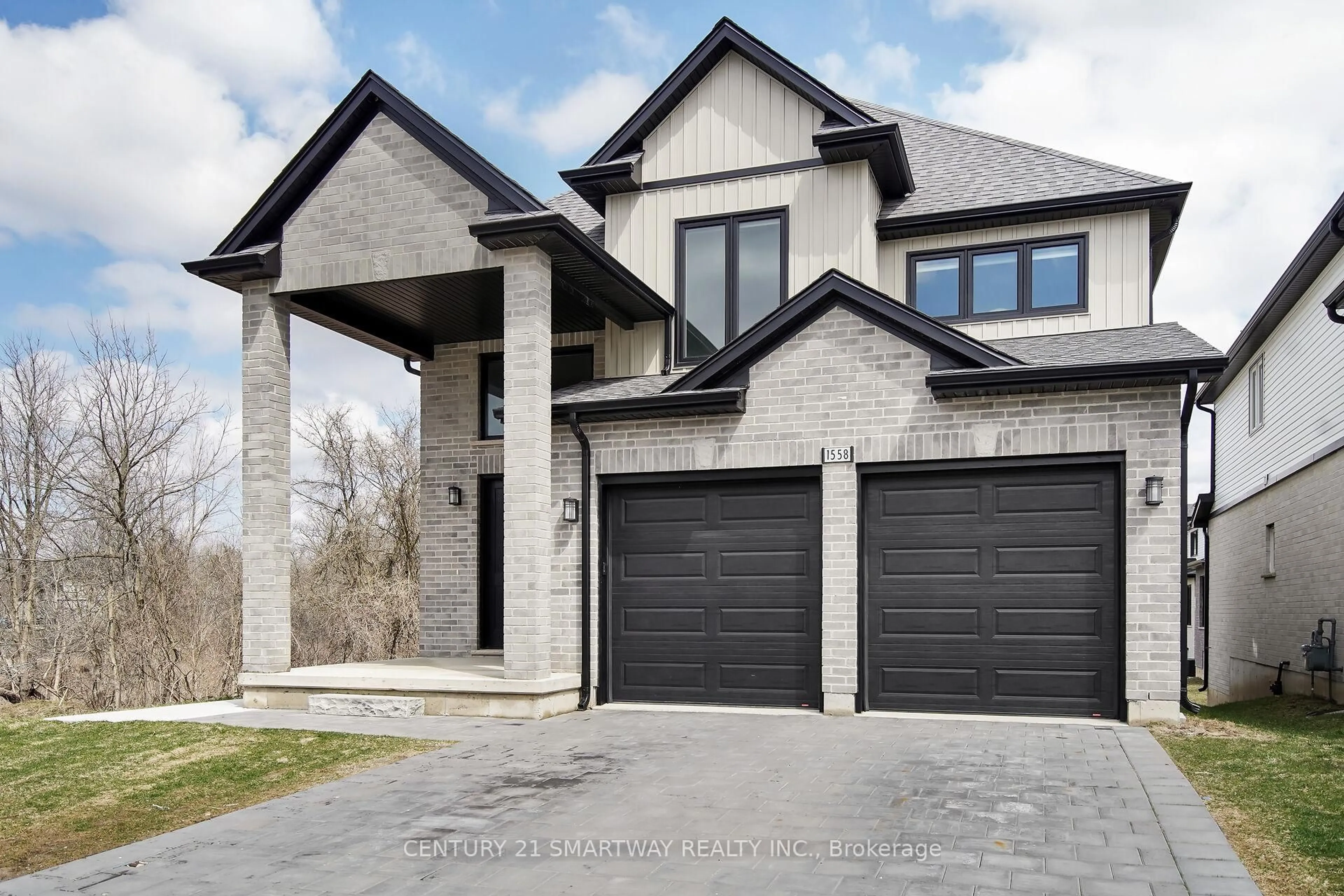 Home with brick exterior material, street for 1558 Chickadee Tr, London South Ontario N6M 0K1