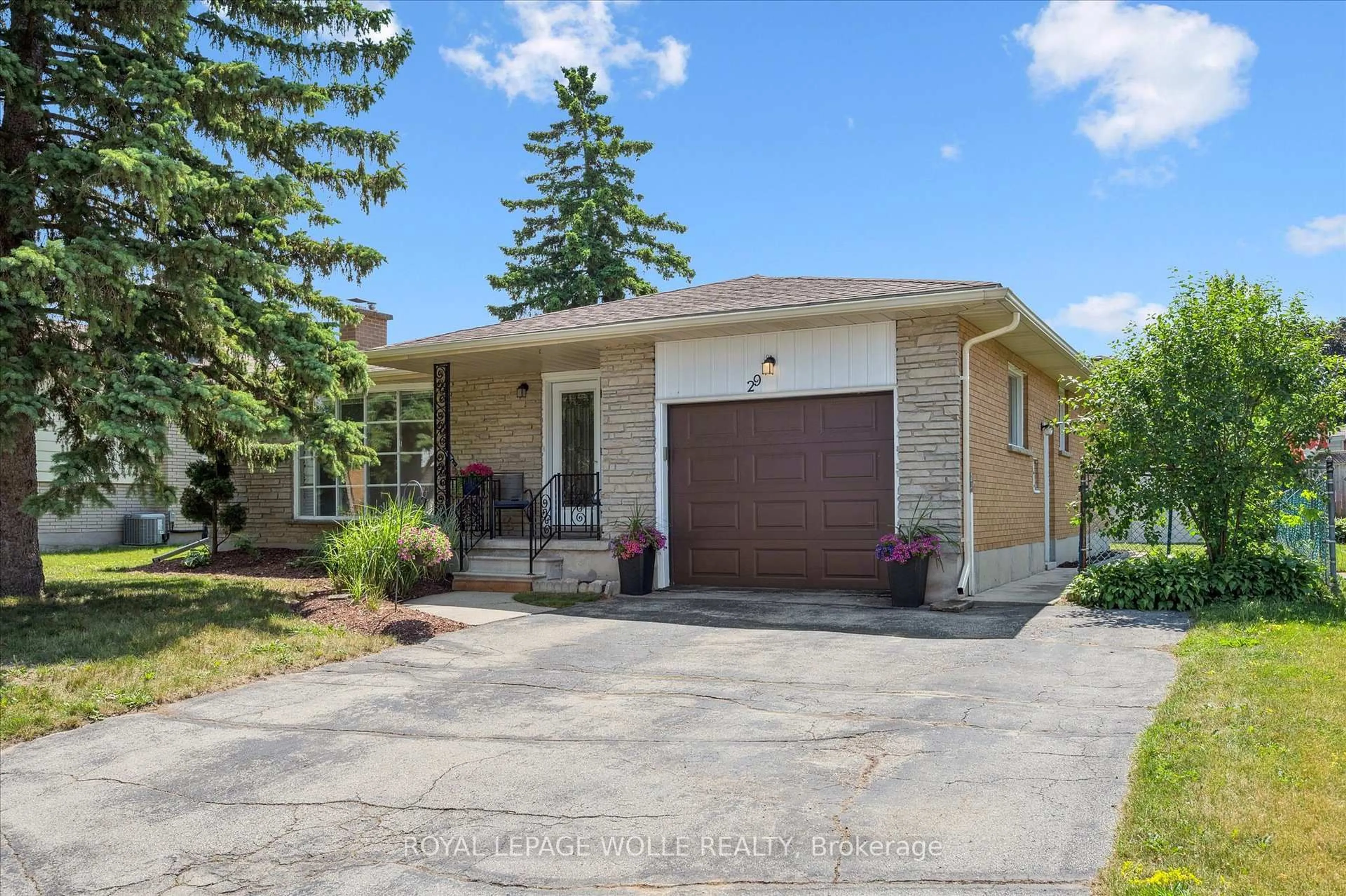 Home with brick exterior material, street for 29 Strathcona Cres, Kitchener Ontario N2B 2W8
