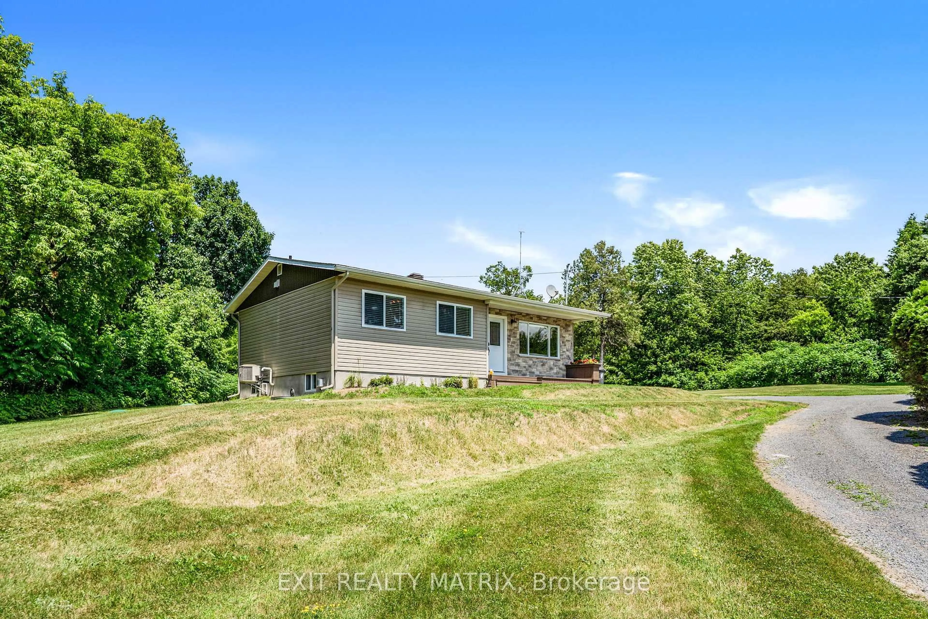 A pic from outside/outdoor area/front of a property/back of a property/a pic from drone, water/lake/river/ocean view for 571 Lac George Rd, Alfred and Plantagenet Ontario K0B 1L0