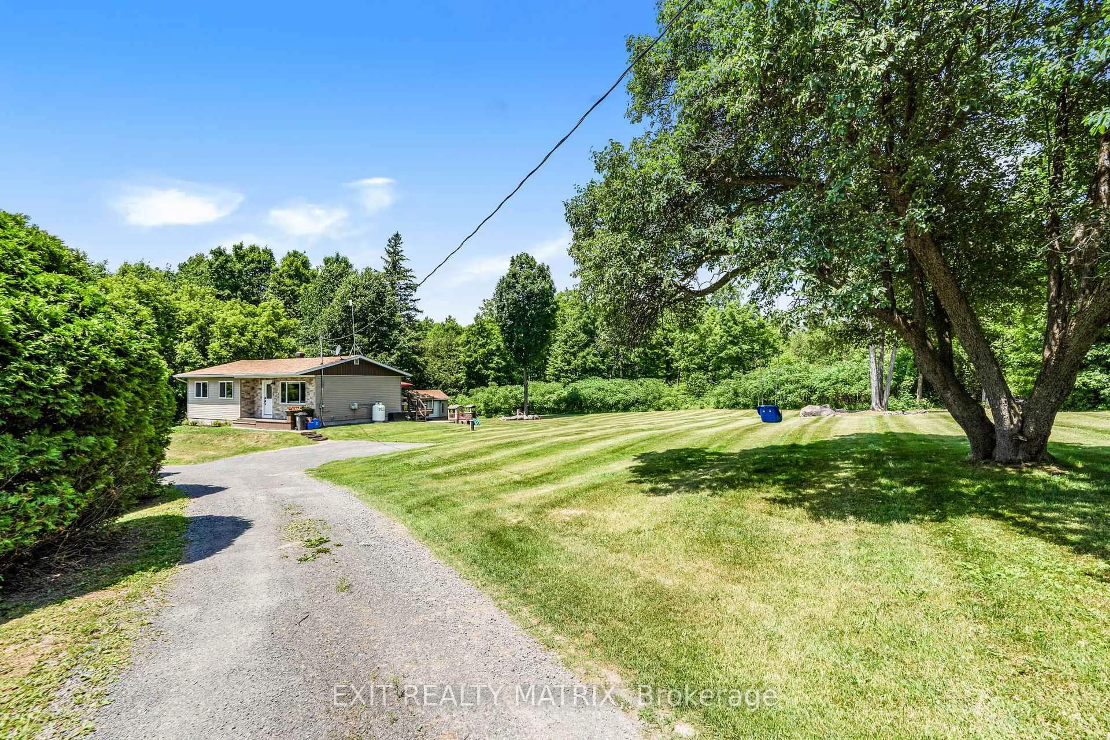 A pic from outside/outdoor area/front of a property/back of a property/a pic from drone, water/lake/river/ocean view for 571 Lac George Rd, Alfred and Plantagenet Ontario K0B 1L0