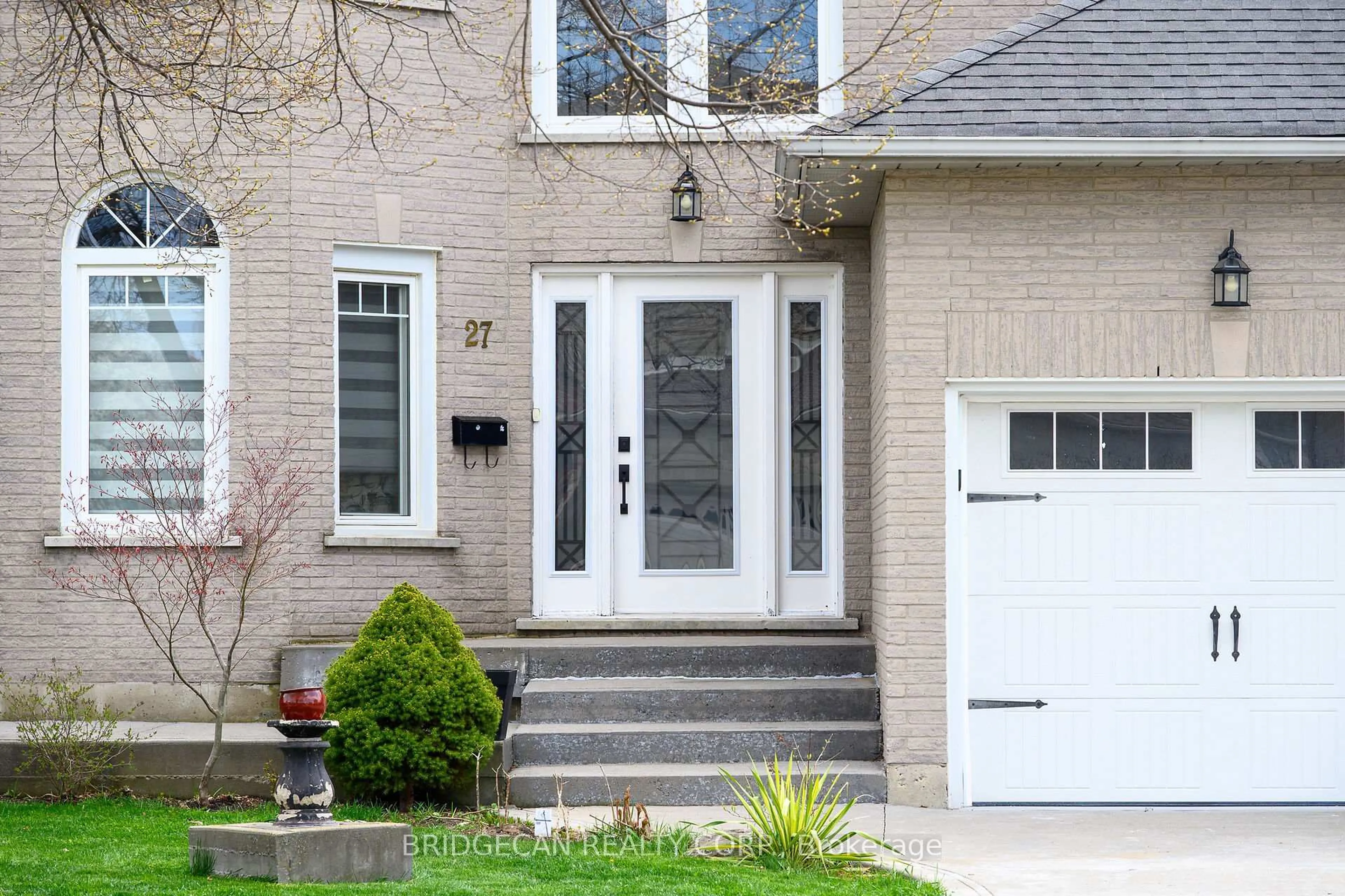 Home with brick exterior material, street for 27 Promenade Dr, Hamilton Ontario L8J 2T3