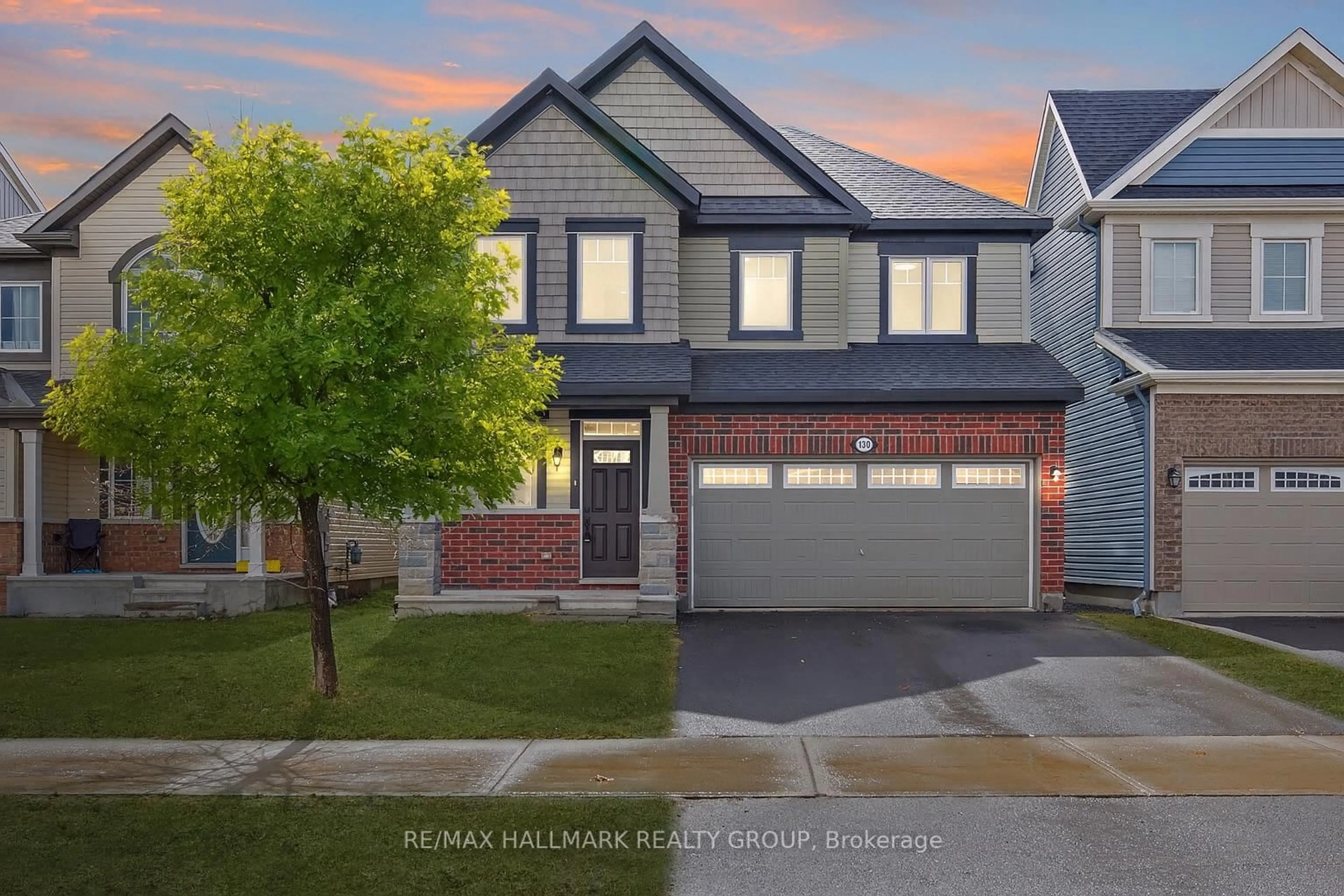 Home with vinyl exterior material, street for 130 Cranesbill Rd, Ottawa Ontario K2V 0J5