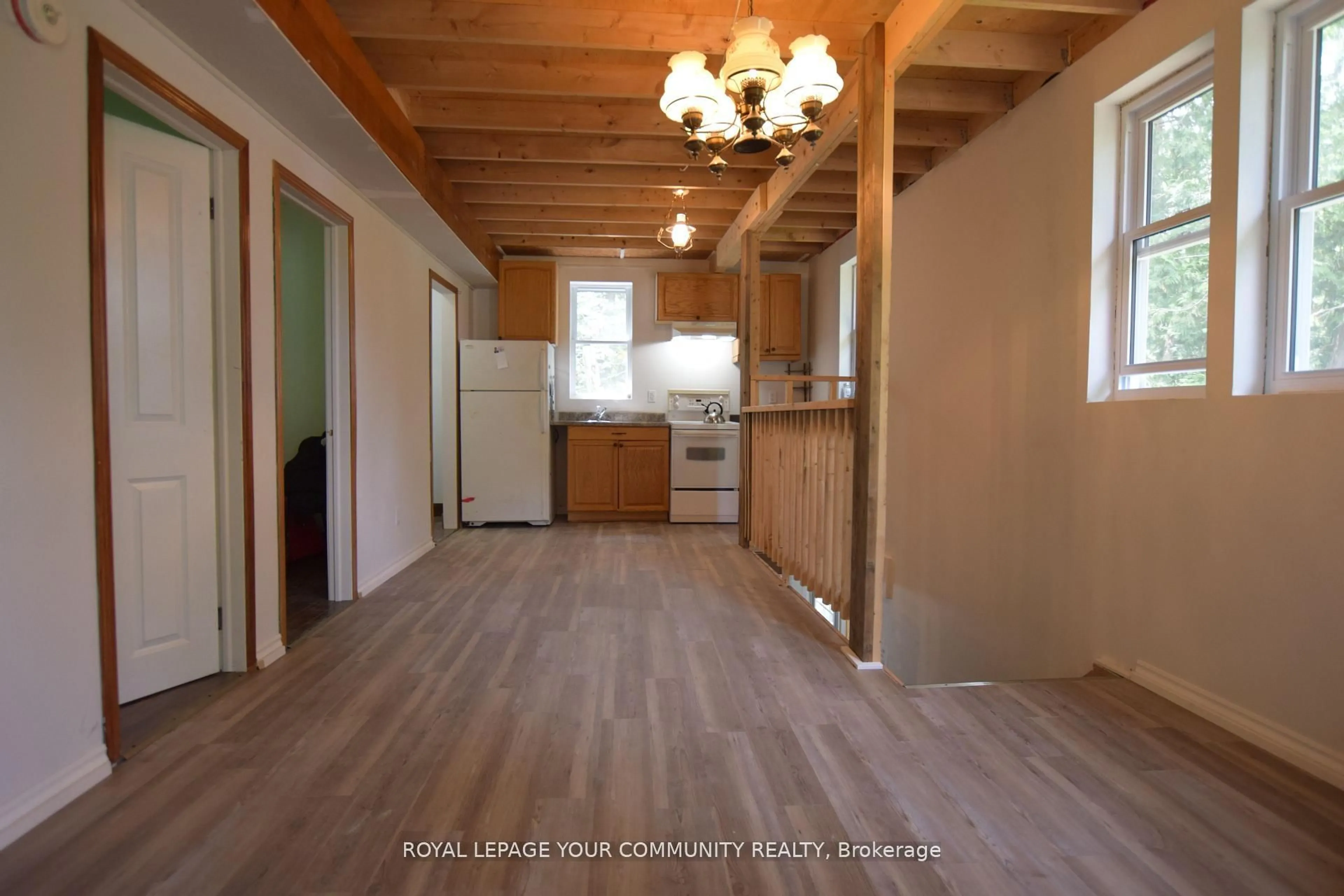 Open concept kitchen, wood/laminate floor for 60 Elder St, Kawartha Lakes Ontario K0M 1L0
