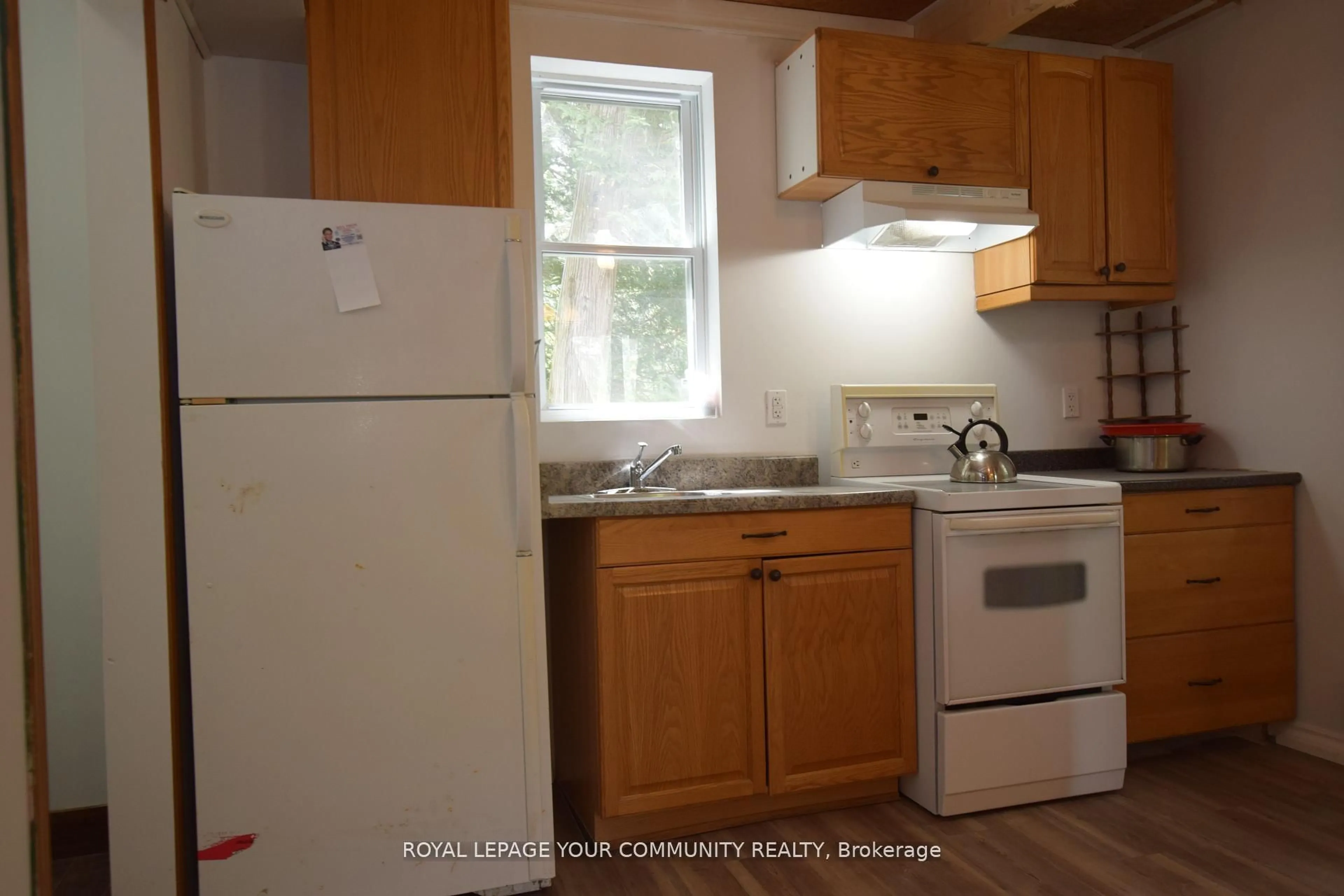 Standard kitchen, wood/laminate floor for 60 Elder St, Kawartha Lakes Ontario K0M 1L0