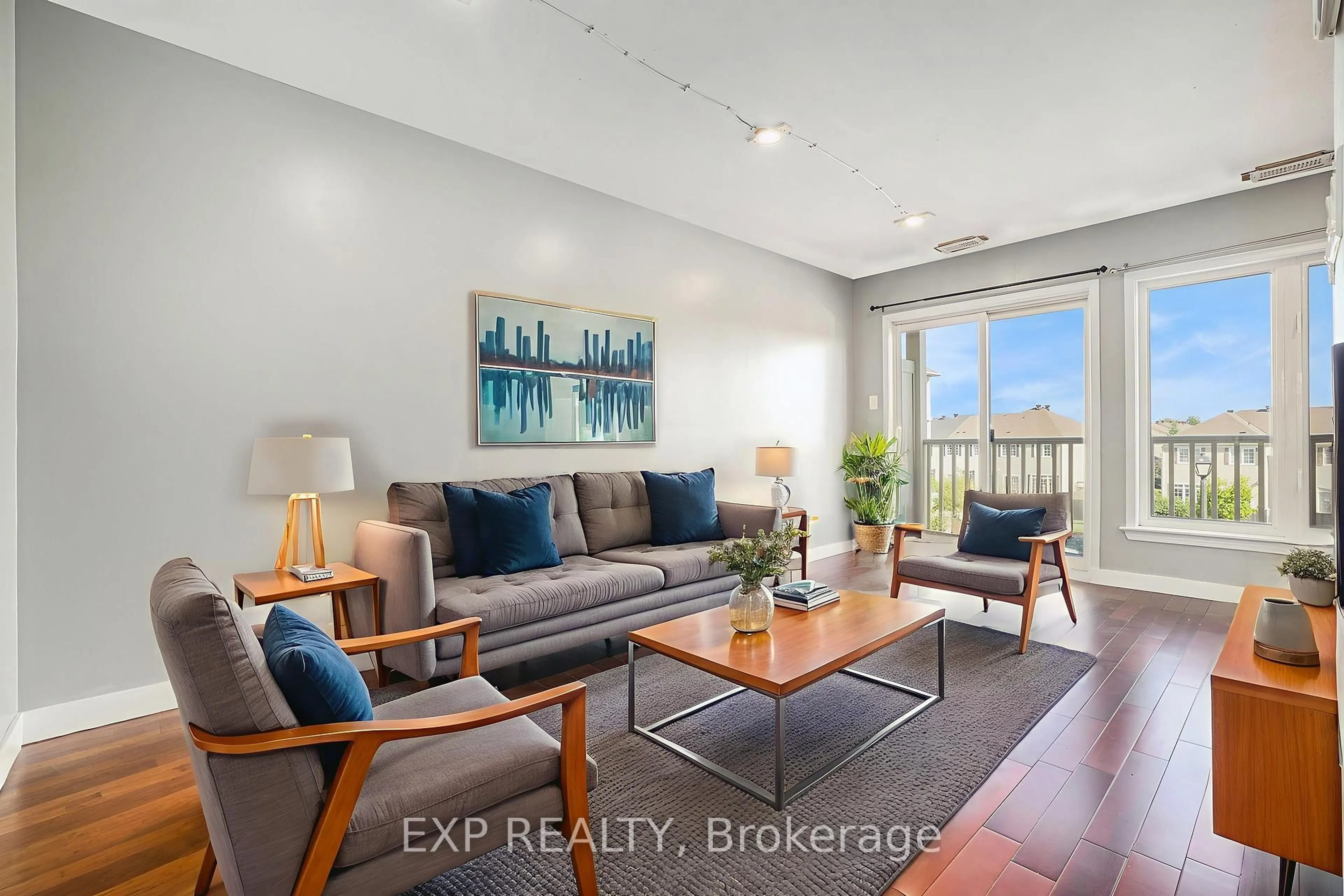 Living room with furniture, wood/laminate floor for 250 Shanly Private, Ottawa Ontario K2J 5X6