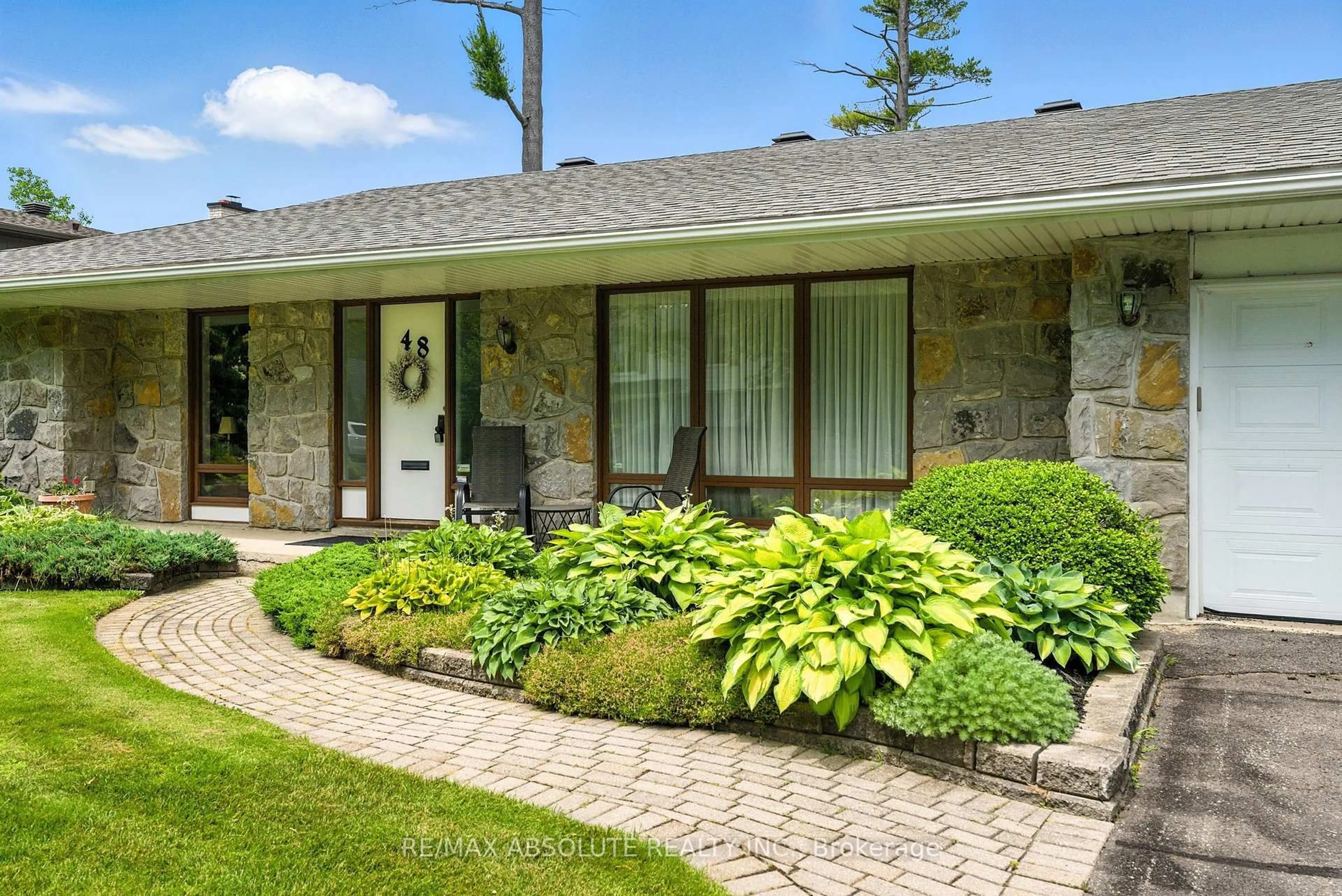 Home with brick exterior material, street for 48 Parkland Cres, Ottawa Ontario K2H 7W5