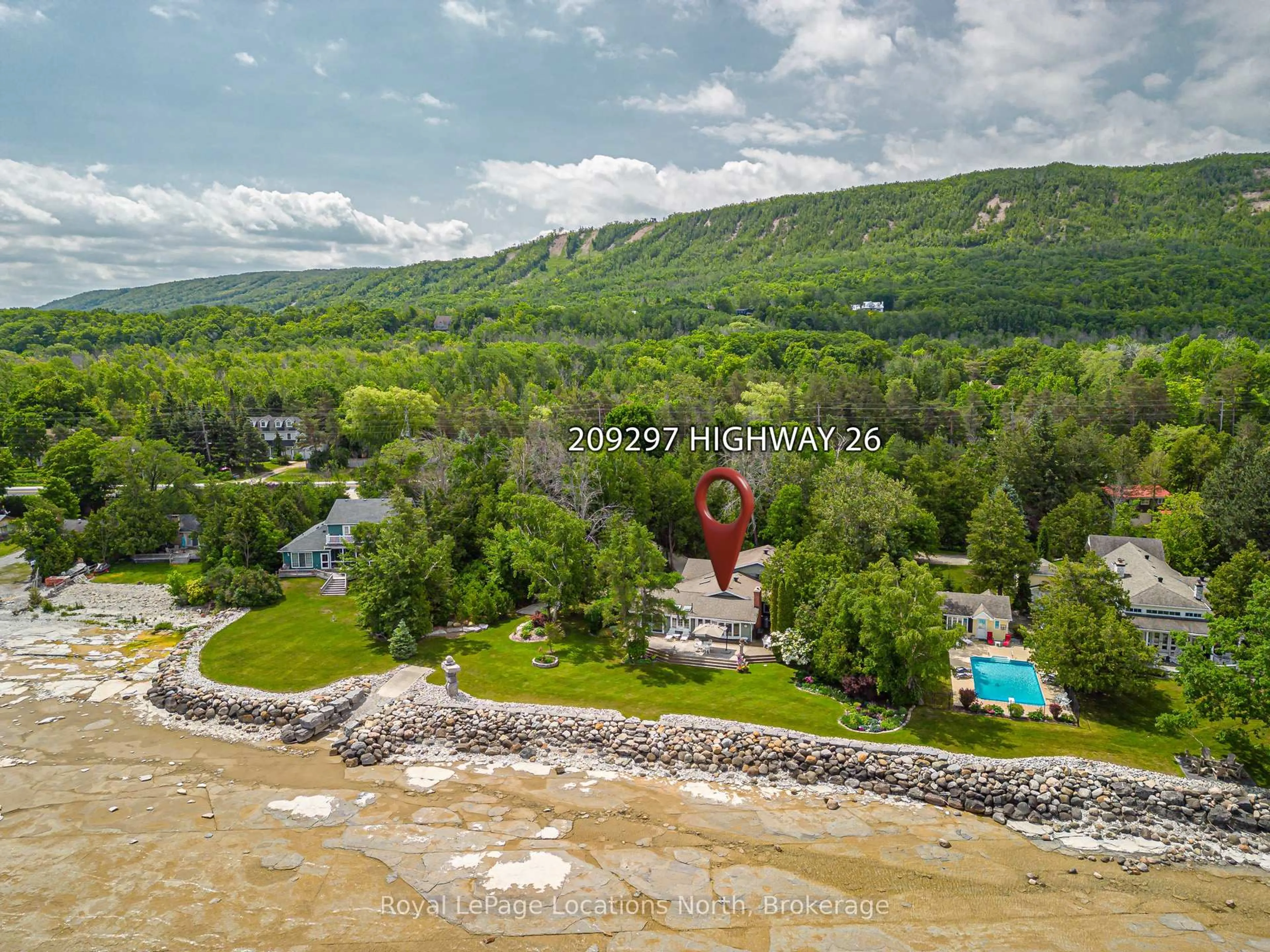 A pic from outside/outdoor area/front of a property/back of a property/a pic from drone, mountain view for 209297 26 Highway, Blue Mountains Ontario L9Y 3Z2
