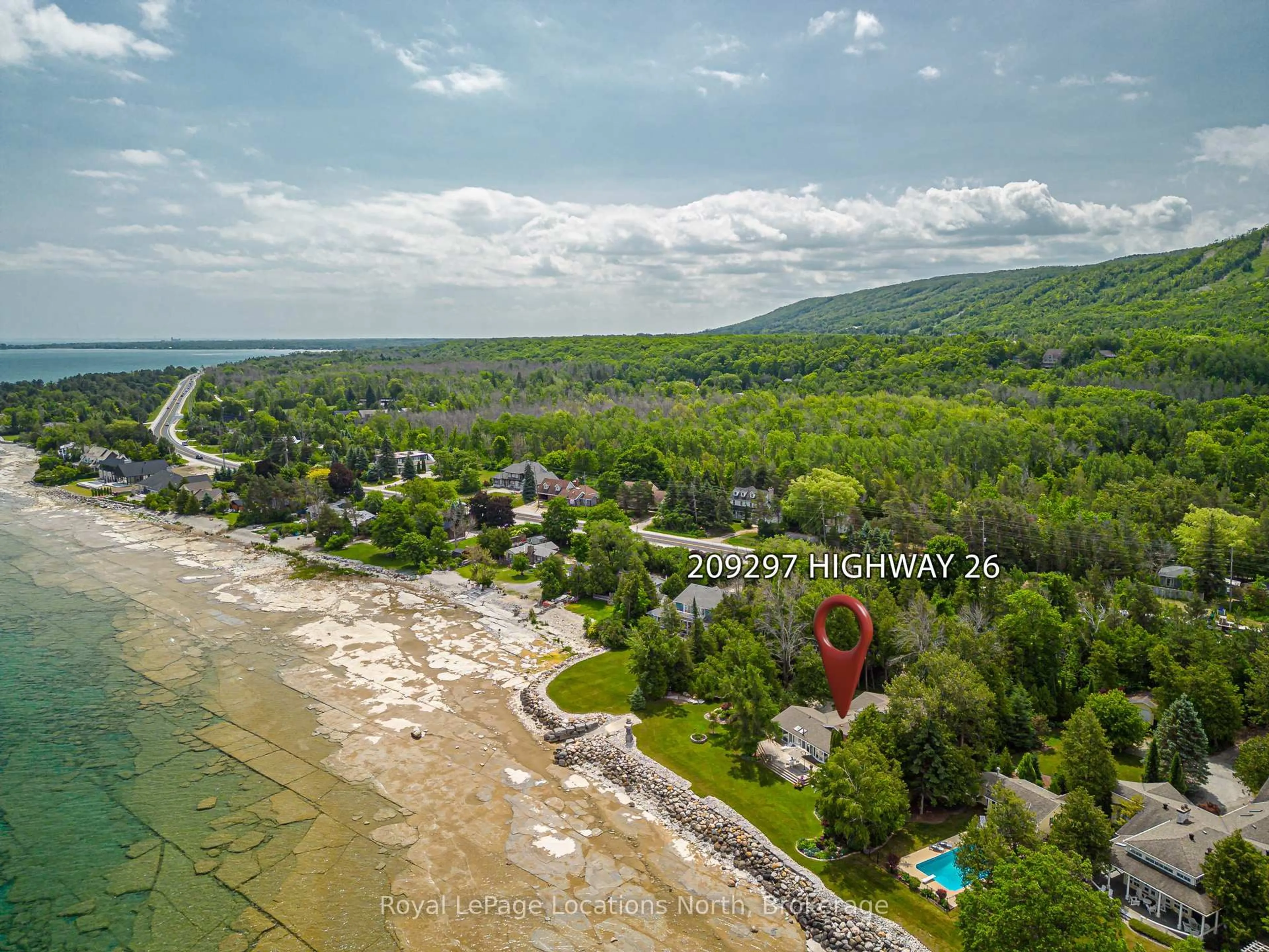 A pic from outside/outdoor area/front of a property/back of a property/a pic from drone, water/lake/river/ocean view for 209297 26 Highway, Blue Mountains Ontario L9Y 3Z2