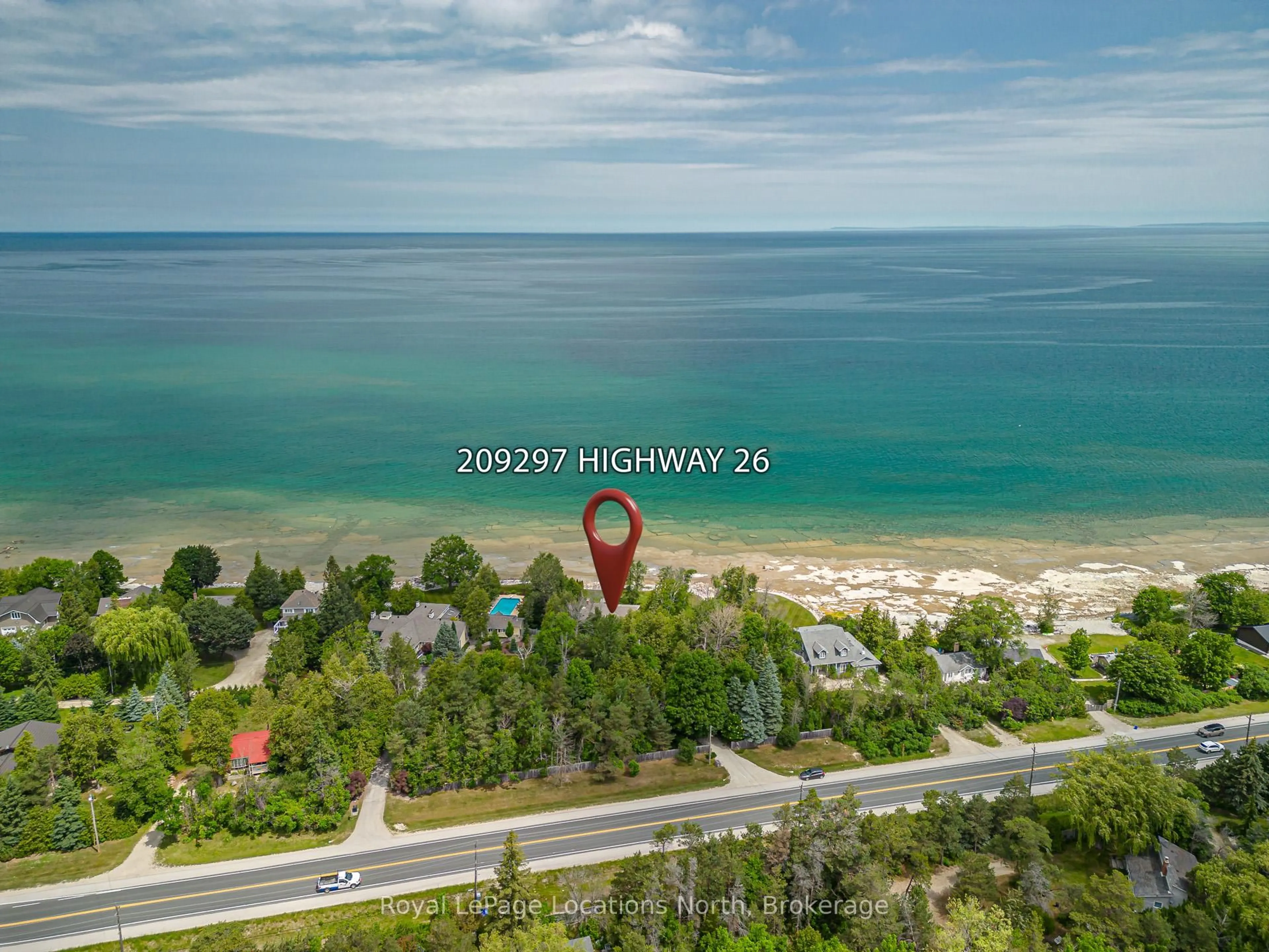 A pic from outside/outdoor area/front of a property/back of a property/a pic from drone, water/lake/river/ocean view for 209297 26 Highway, Blue Mountains Ontario L9Y 3Z2