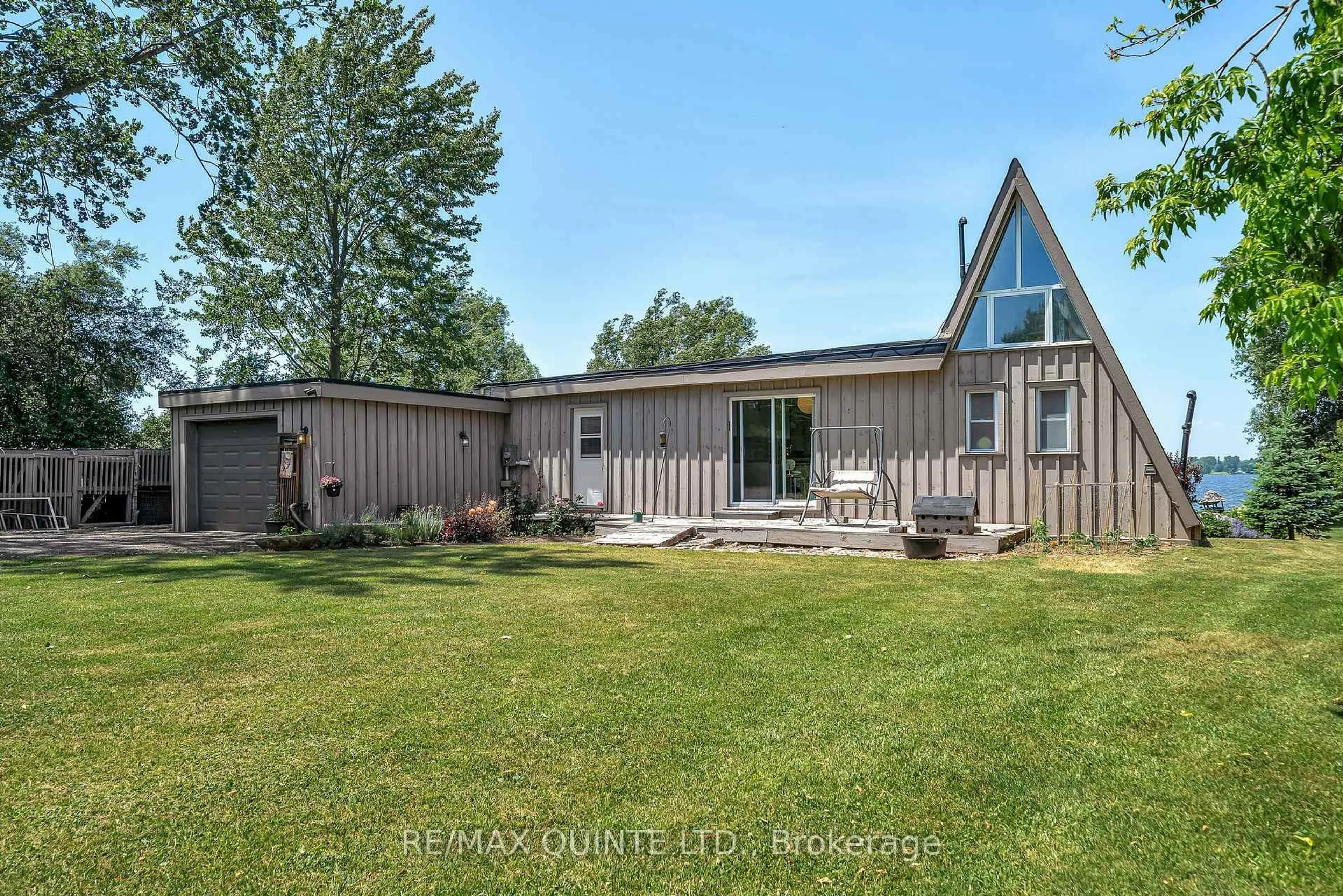 A pic from outside/outdoor area/front of a property/back of a property/a pic from drone, water/lake/river/ocean view for 124 Onderdonk Lane, Prince Edward County Ontario K0K 1V0