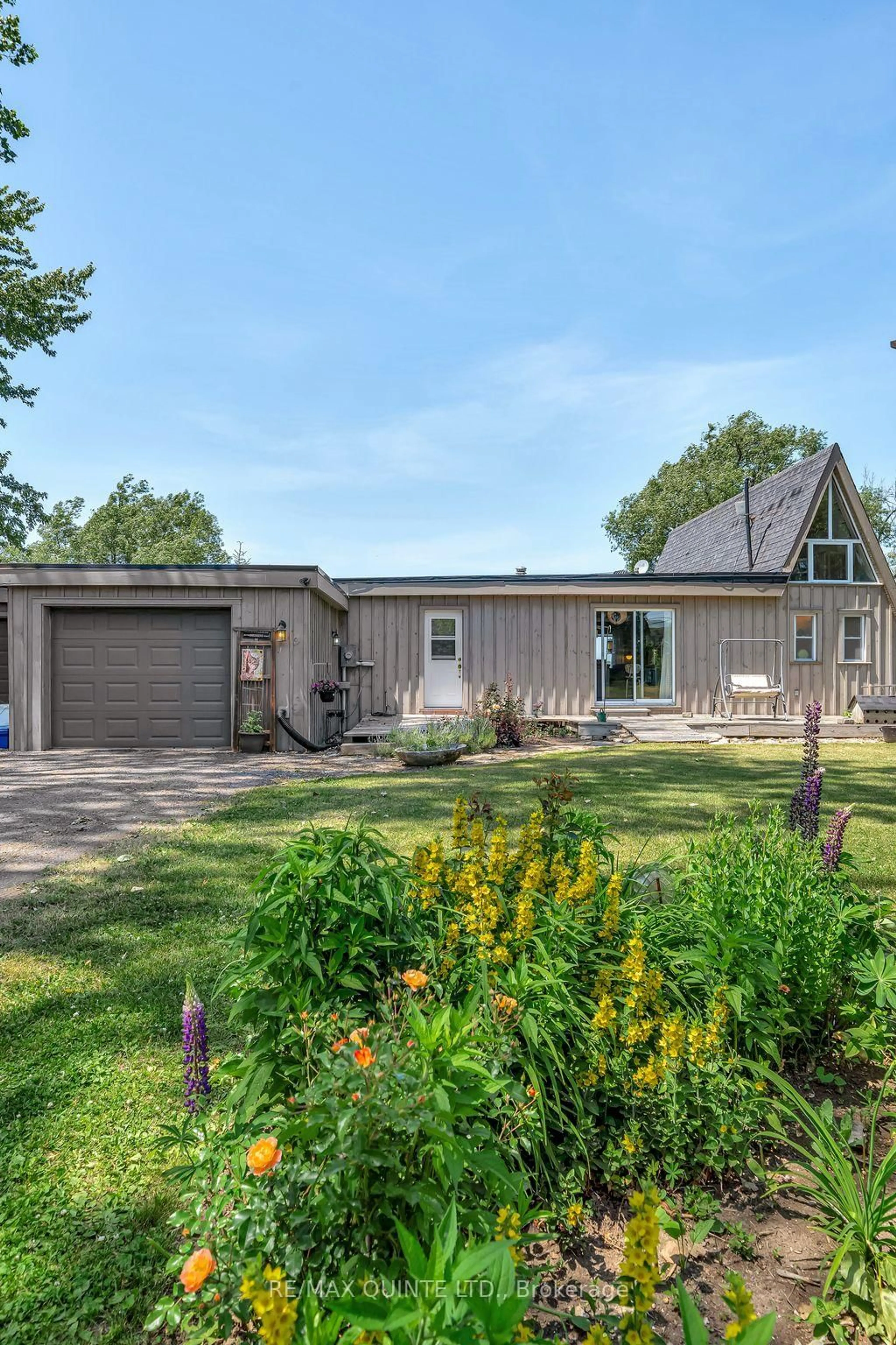 Home with vinyl exterior material, street for 124 Onderdonk Lane, Prince Edward County Ontario K0K 1V0