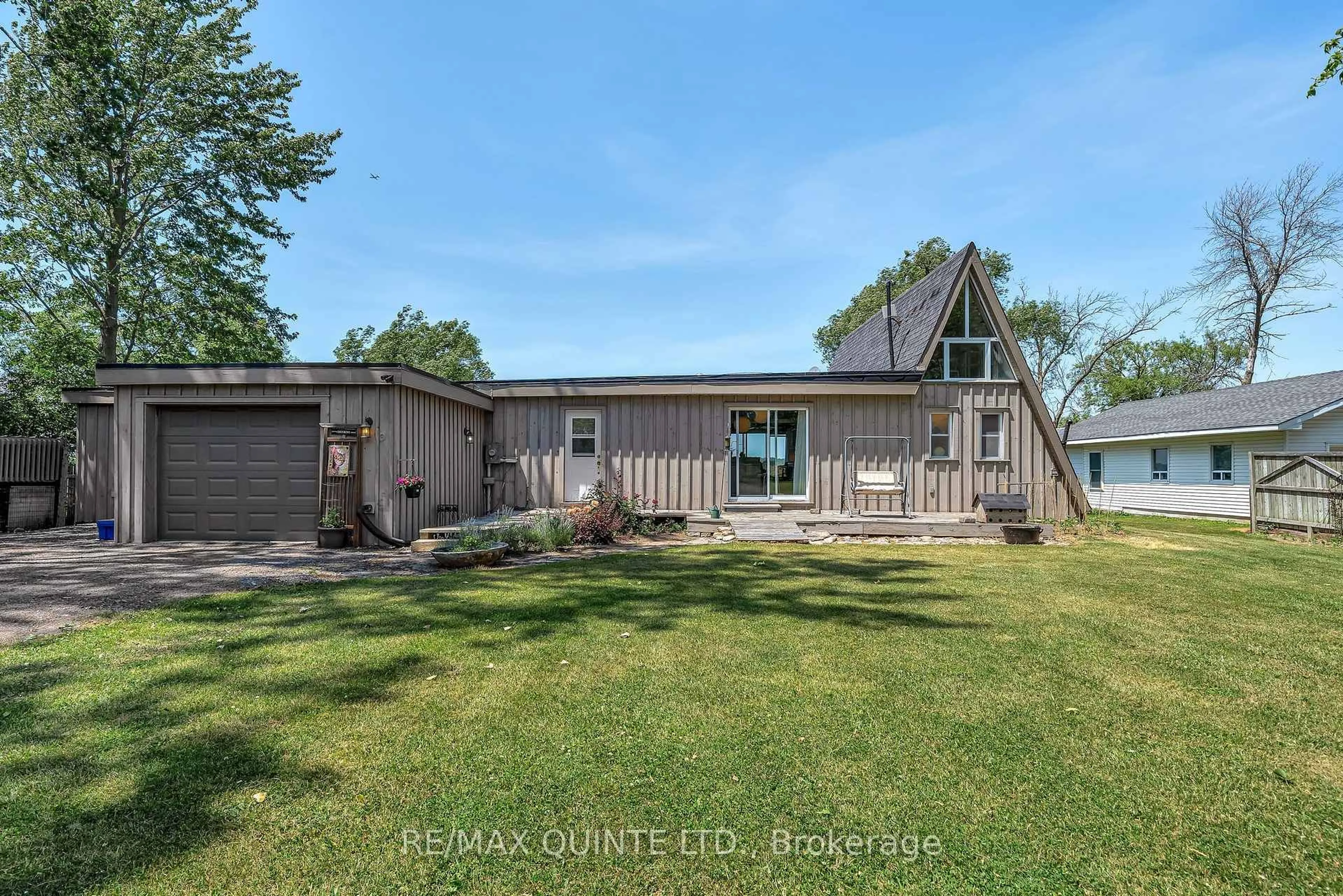 A pic from outside/outdoor area/front of a property/back of a property/a pic from drone, water/lake/river/ocean view for 124 Onderdonk Lane, Prince Edward County Ontario K0K 1V0