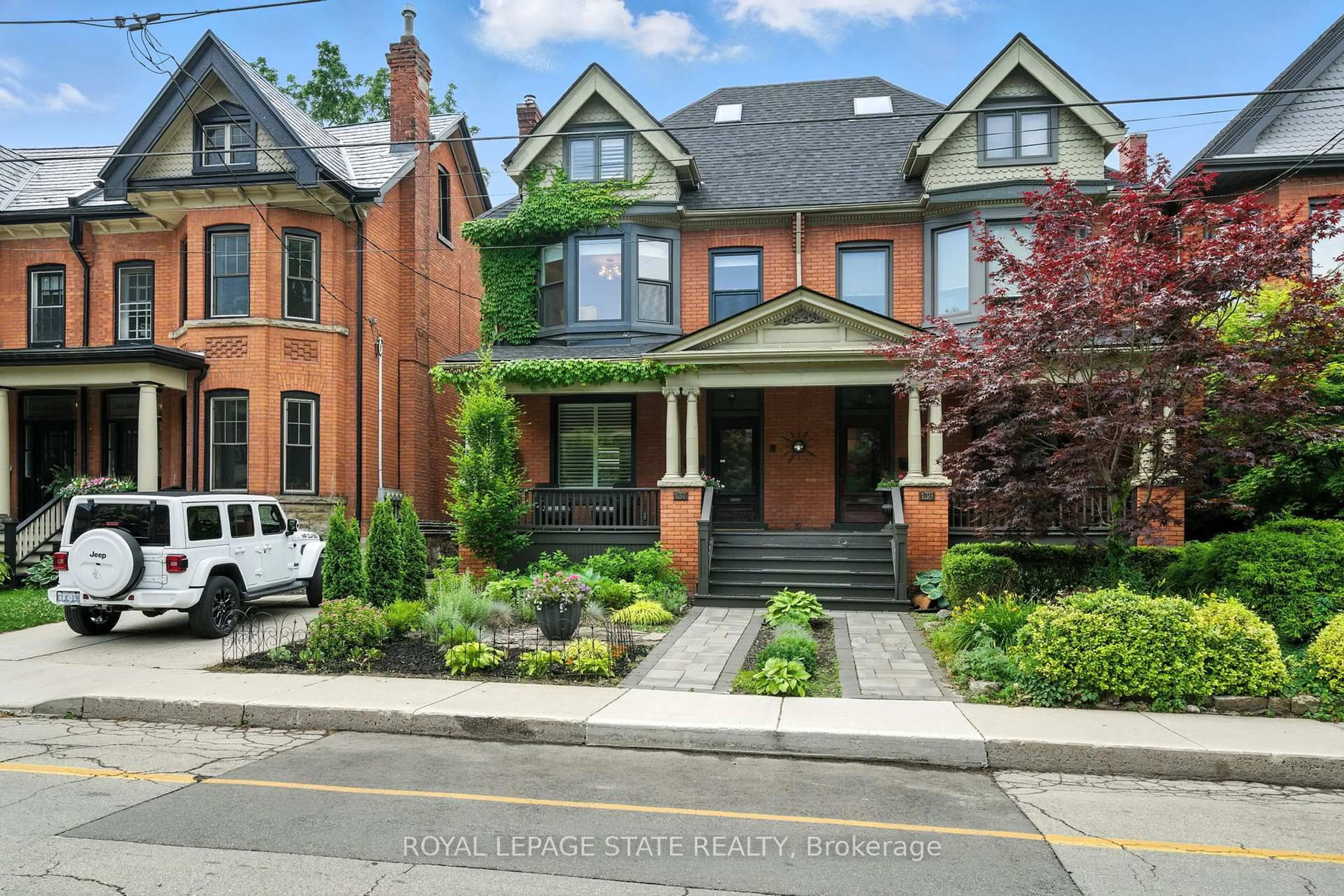 Home with brick exterior material, street for 137 Markland St, Hamilton Ontario L8P 2K3