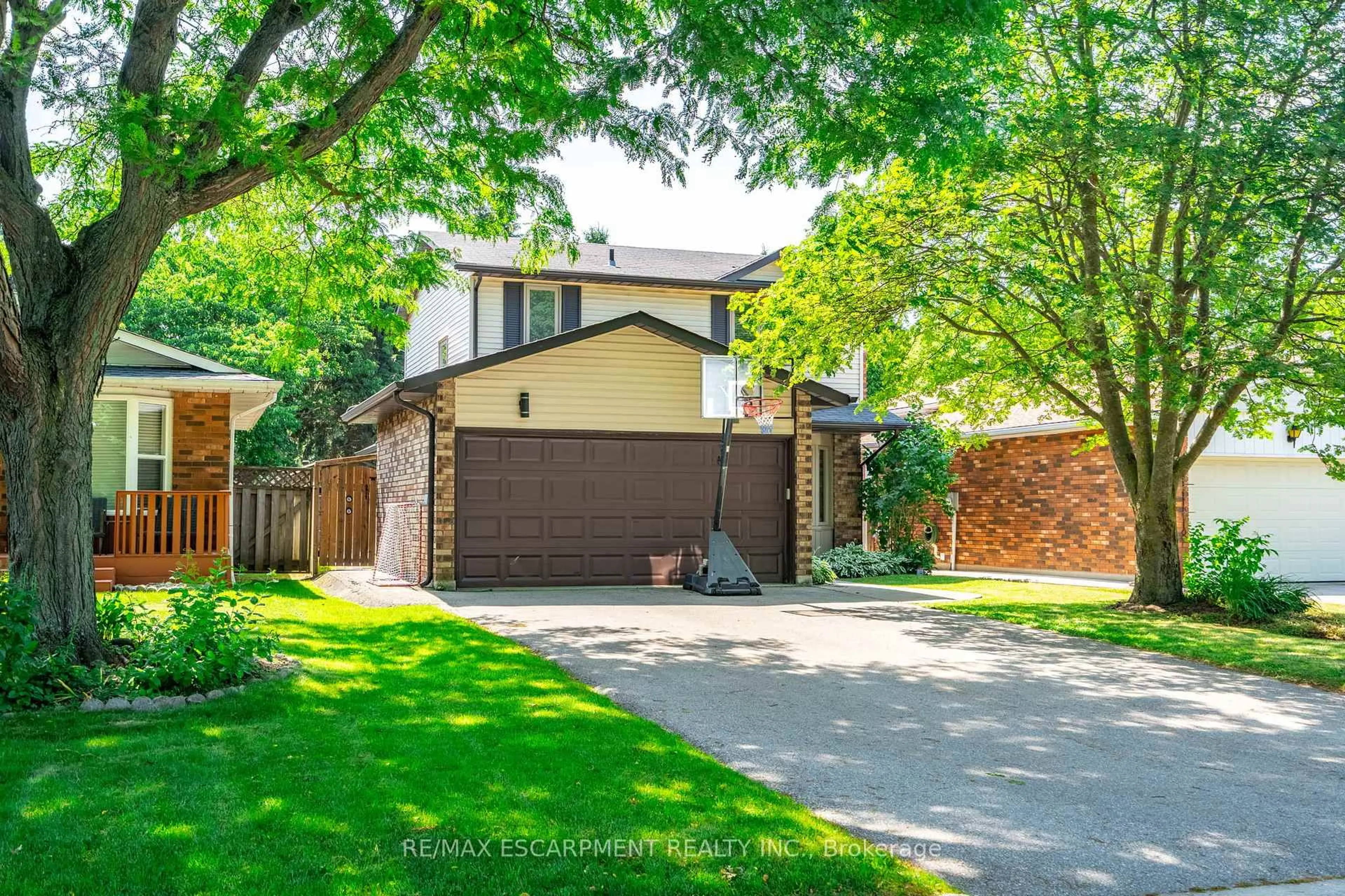Home with brick exterior material, street for 12 Bloomsbury Crt, Hamilton Ontario L9G 4L6