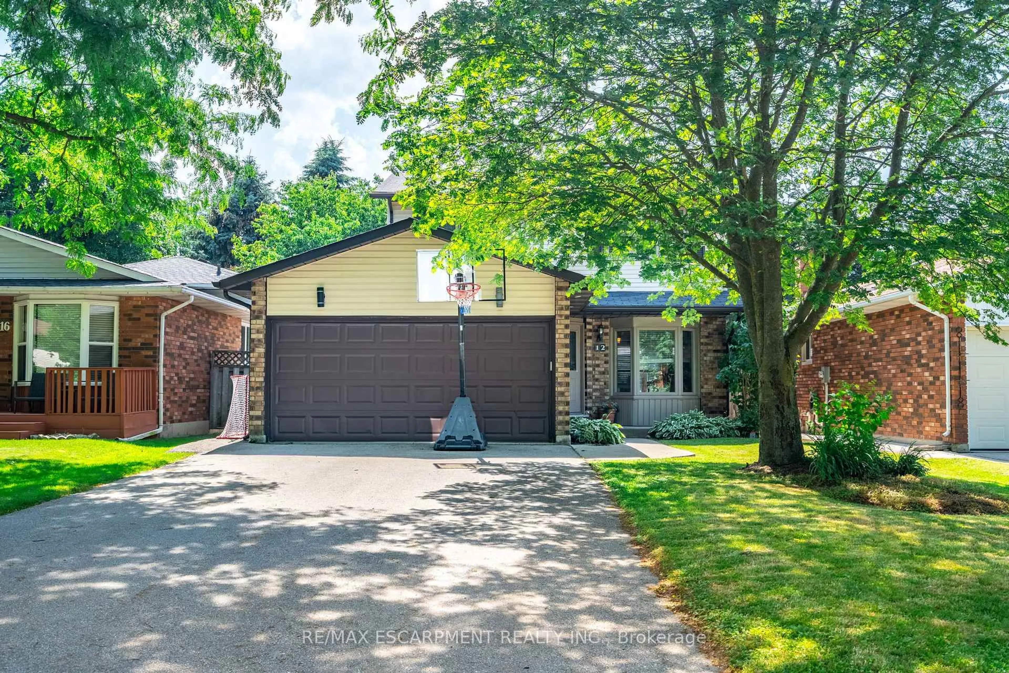 Home with brick exterior material, street for 12 Bloomsbury Crt, Hamilton Ontario L9G 4L6