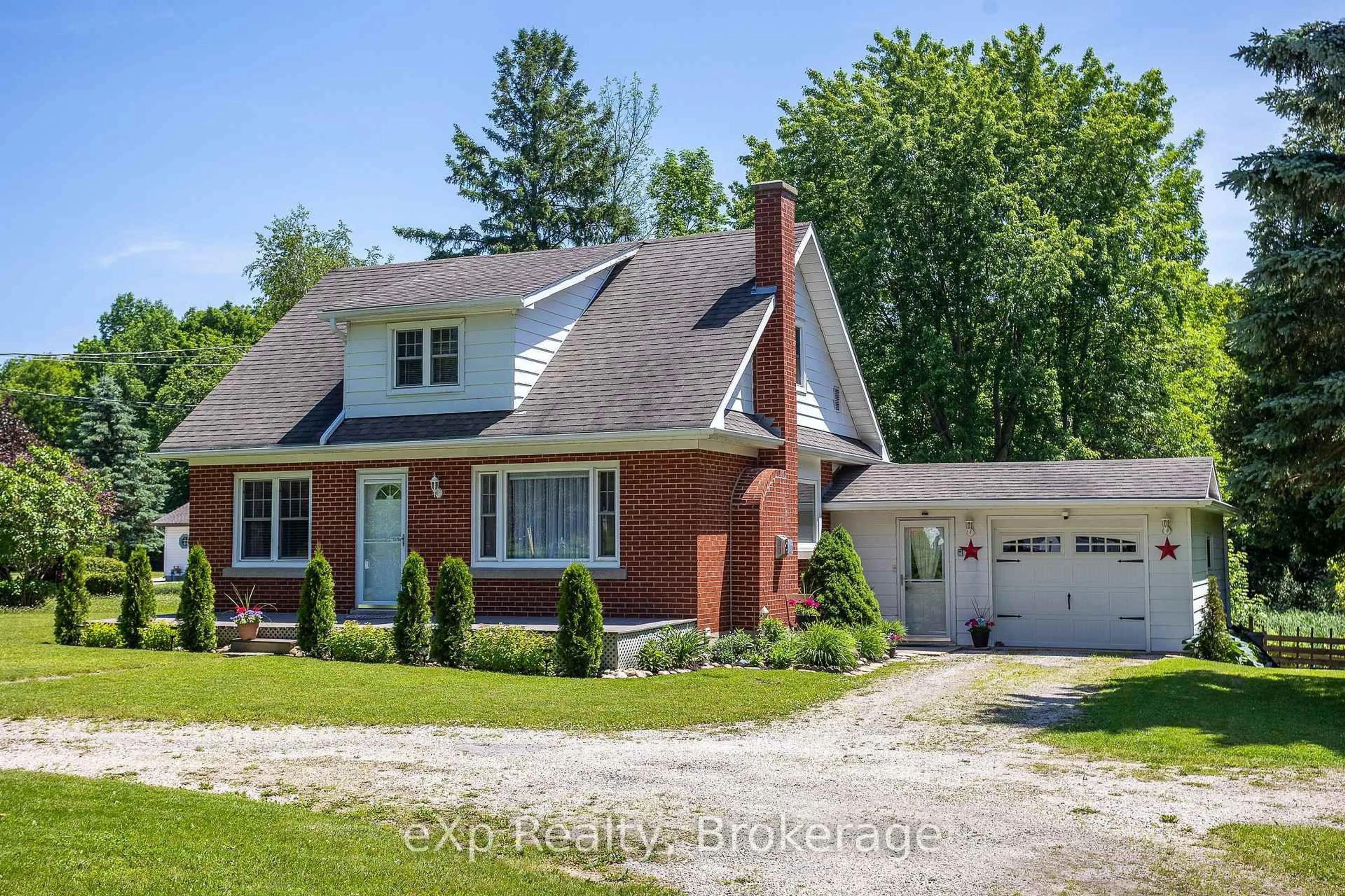 Home with brick exterior material, street for 318827 Grey Road 1, Georgian Bluffs Ontario N4K 5N4