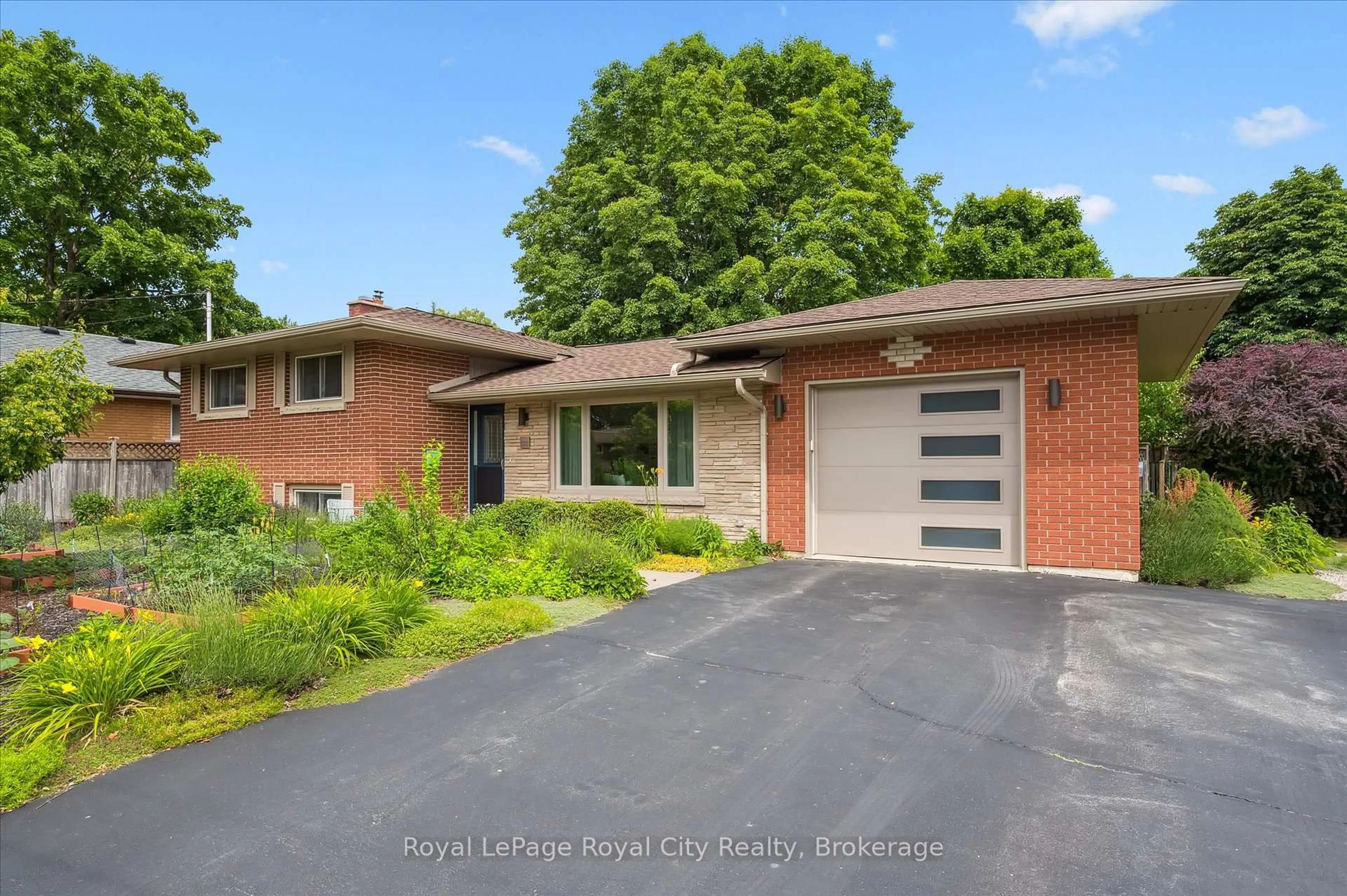 Home with brick exterior material, street for 1 Balmoral Dr, Guelph Ontario N1E 3N5