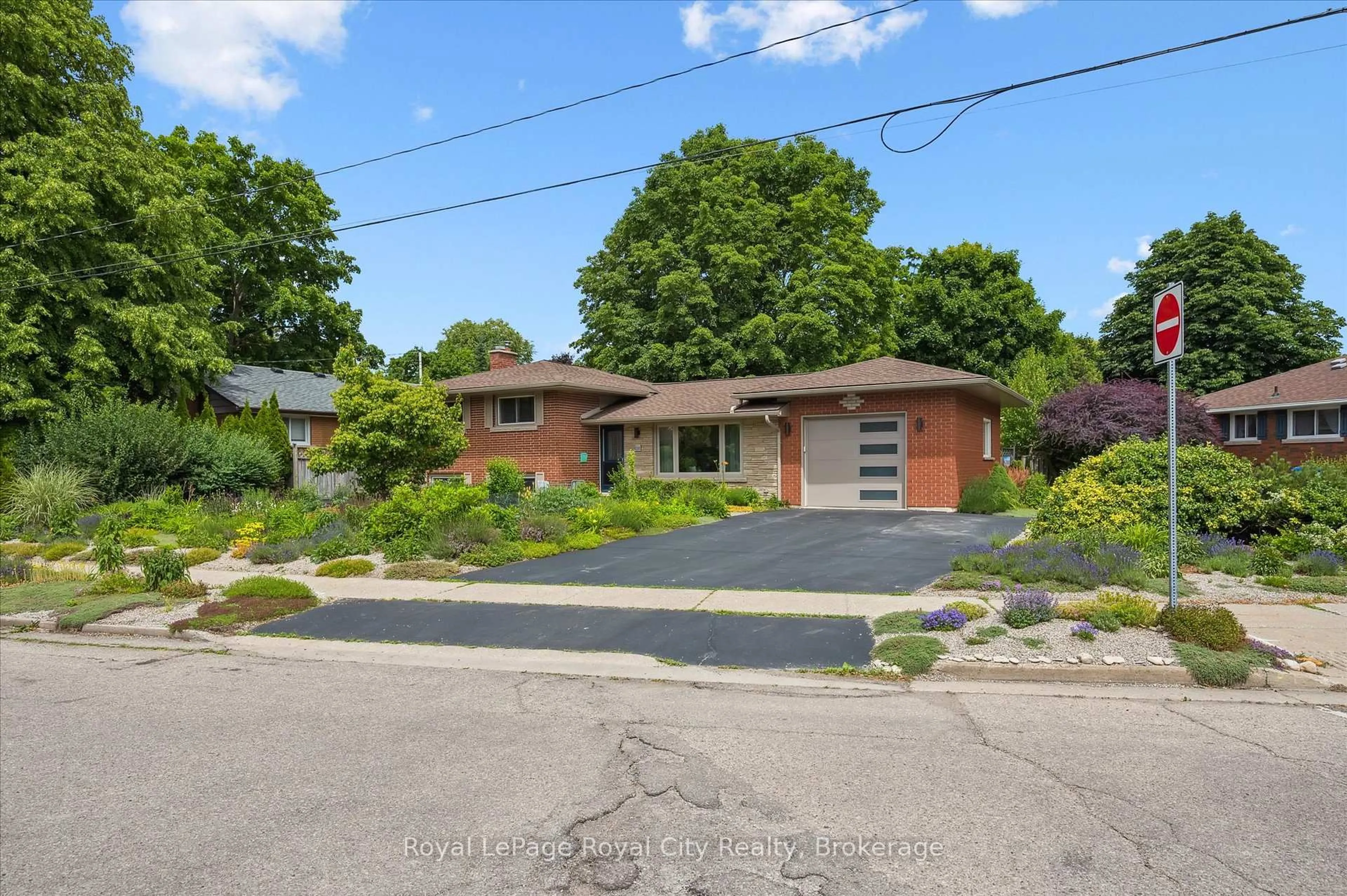 Home with brick exterior material, street for 1 Balmoral Dr, Guelph Ontario N1E 3N5